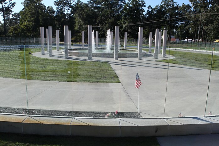 The Onslow Vietnam Veterans Memorial in the Lejeune Memorial Gardens in Jacksonville, N.C. recognizes the nearly ten million service members who served on active duty during the Vietnam era. The memorial's glass walls are inscribed with the names of the 58,229 service members whose lives were lost in the Vietnam War.