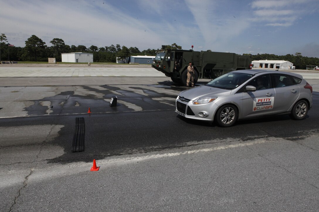 Service members took part in the Richard Petty Safe Driving Course aboard the Marine Corps Auxiliary Landing Field Bogue, recently. The participants received instruction and then got behind the wheel to practice braking in wet and dry conditions and learn to steer through a front and rear wheel skid.