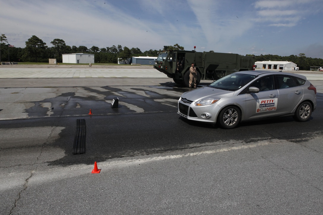 Service members took part in the Richard Petty Safe Driving Course aboard the Marine Corps Auxiliary Landing Field Bogue, recently. The participants received instruction and then got behind the wheel to practice braking in wet and dry conditions and learn to steer through a front and rear wheel skid.