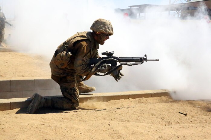 Pfc. Ryan T. Bobbit of Company M, 3rd Recruit Training Battalion, rushes to complete Copeland’s Assault course during the Crucible at Edson Range aboard Marine Corps Base Camp Pendleton, Calif., Sept. 4.   Bobbit was meritoriously promoted to private first class for his performance during recruit training.