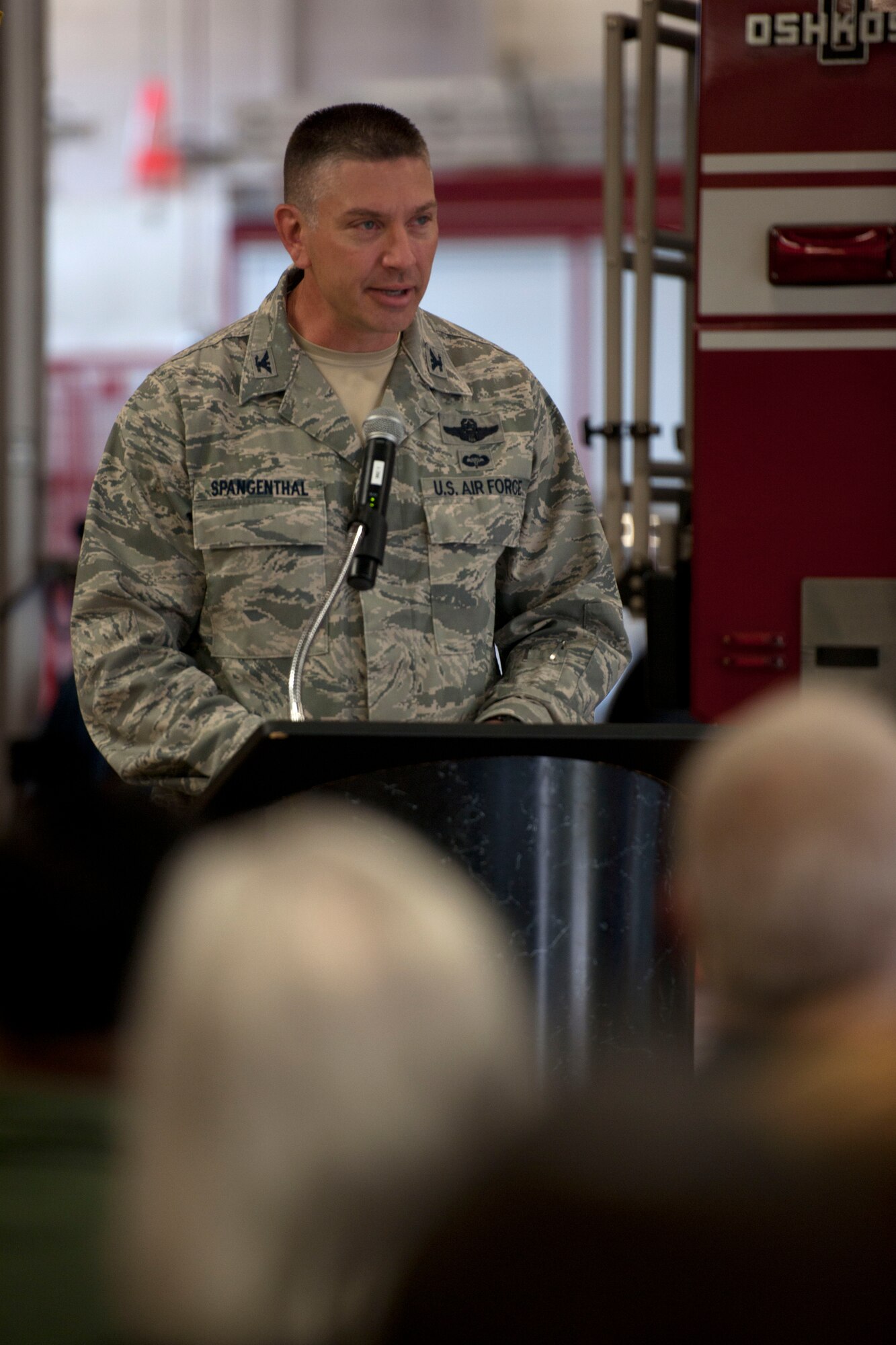 ALTUS AIR FORCE BASE, Okla. – Col. Bill Spangenthal, 97th Air Mobility Wing commander, speaks during a  9/11 remembrance ceremony Sept. 11 at the base fire department. To honor the 43 fallen New York City firefighters and the 23 police officers who lost their lives Sept. 11, 2001, the ceremony consisted of several memorial traditions to include prayers, a flag folding and the ringing of the final alarm. (U.S. Air Force Photo by Senior Airman Jesse Lopez / Released)