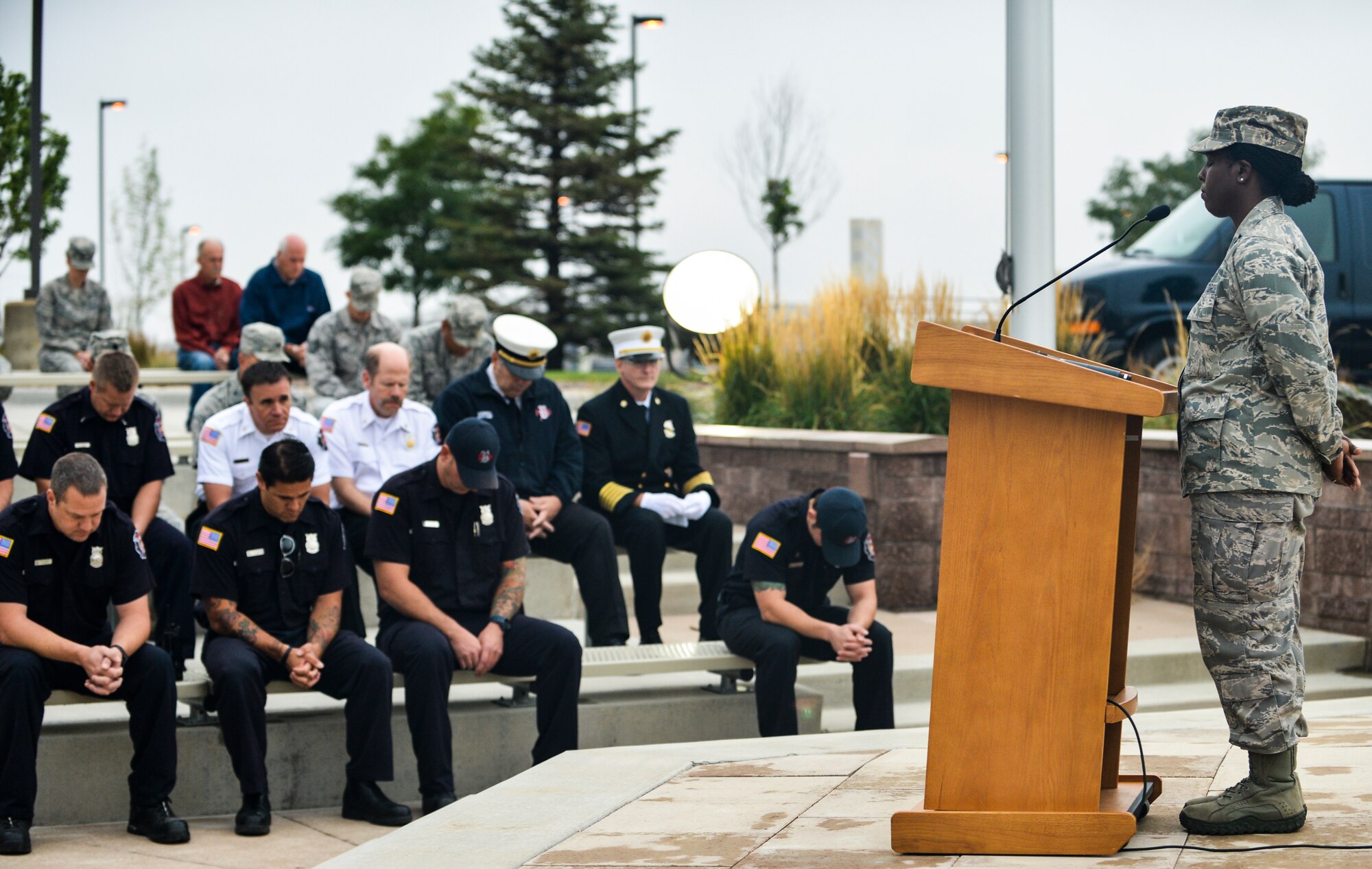 Chaplain (Capt.) Tamara Rue, 460th Space Wing, gives the invocation during the Patriot Day and National Day of Remembrance ceremony Sept. 11, 2013, at the 460th Space Wing headquarters building on Buckley Air Force Base, Colo. The ceremony honored the lives lost 12 years ago in the 9/11 terrorist attacks in New York City. (U.S. Air Force photo by Staff Sgt. Paul Labbe/Released)