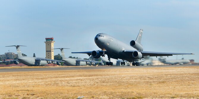 A 22-aircraft "freedom launch" took place at Travis AFB, Calif., Sept. 11, 2013. Seven C-17 Globemaster IIIs, 11 KC-10 Extenders and four C-5B Galaxies from the 60th Air Mobility Wing launched consecutively over 36 minutes to take part in Air Mobility Command missions. The first plane in the lineup, a C-17, launched at 8:46 a.m., the same time terrorists crashed American Airlines Flight 11 into the North Tower of the World Trade Center in New York City 12 years earlier. (U.S. Air Force photo/T.C. Perkins Jr. Released) 
