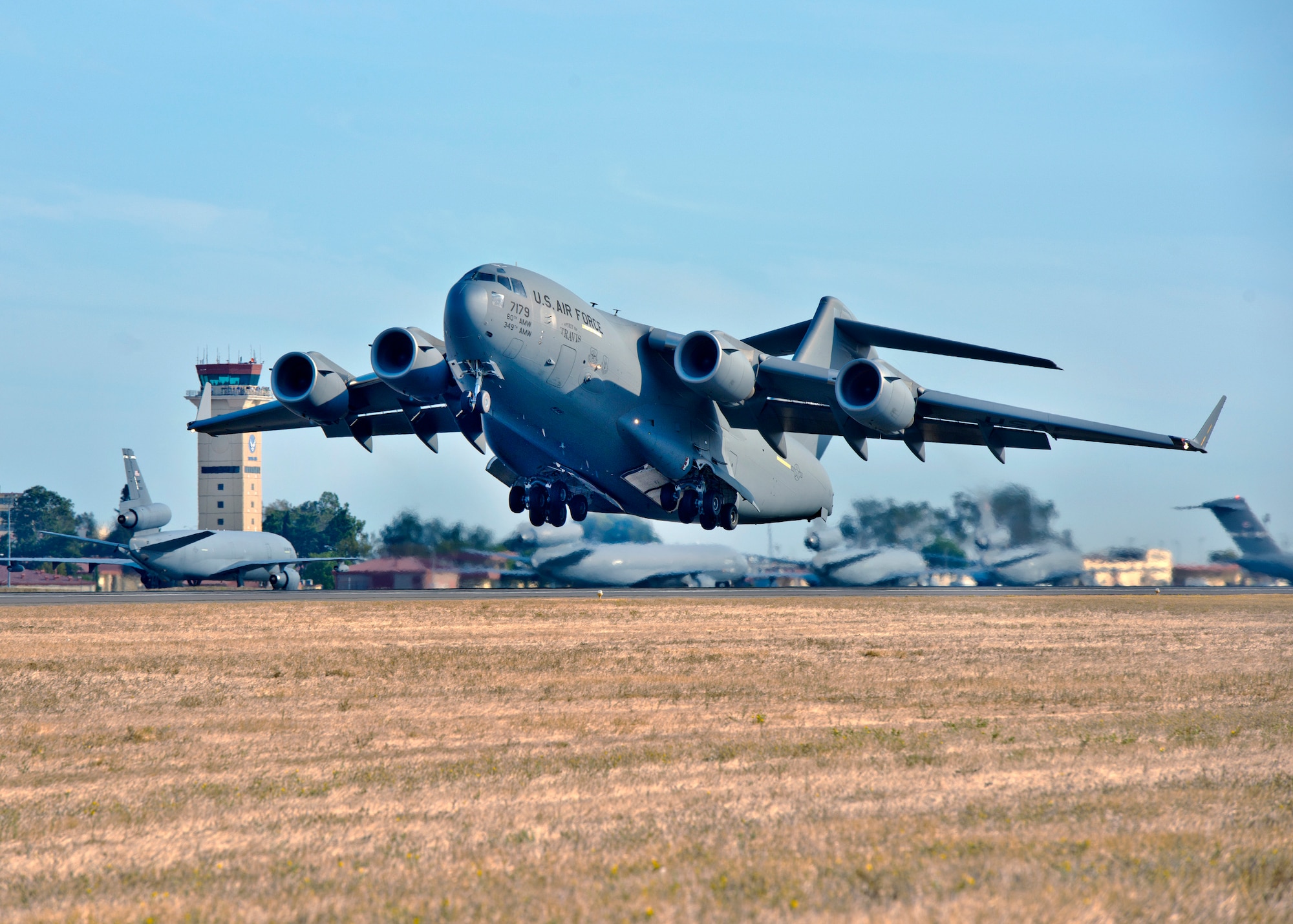 A 22-aircraft "freedom launch" took place at Travis AFB, Calif., Sept. 11, 2013. Seven C-17 Globemaster IIIs, 11 KC-10 Extenders and four C-5B Galaxies from the 60th Air Mobility Wing lined up in what is historically referred to as an "elephant walk," then launched consecutively over 36 minutes to take part in Air Mobility Command missions. The first plane in the lineup, a C-17, launched at 8:46 a.m., the same time terrorists crashed American Airlines Flight 11 into the North Tower of the World Trade Center in New York City 12 years earlier. (U.S. Air Force photo by T.C. Perkins Jr. Released)