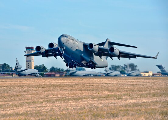 A 22-aircraft "freedom launch" took place at Travis AFB, Calif., Sept. 11, 2013. Seven C-17 Globemaster IIIs, 11 KC-10 Extenders and four C-5B Galaxies from the 60th Air Mobility Wing launched consecutively over 36 minutes to take part in Air Mobility Command missions. The first plane in the lineup, a C-17, launched at 8:46 a.m., the same time terrorists crashed American Airlines Flight 11 into the North Tower of the World Trade Center in New York City 12 years earlier. (U.S. Air Force photo/T.C. Perkins Jr. Released) 
