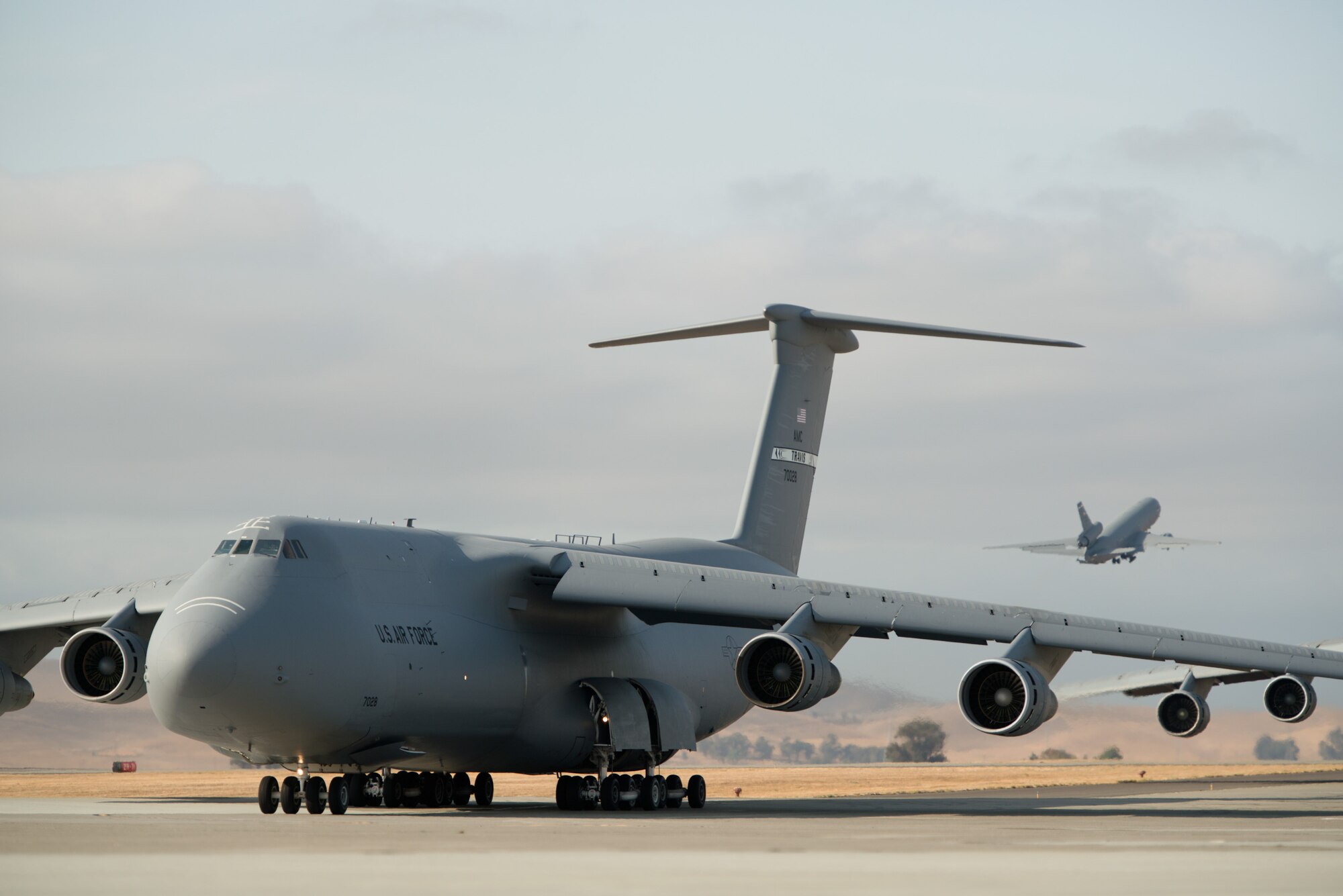 A 22-aircraft "freedom launch" took place at Travis AFB, Calif., Sept. 11, 2013. Seven C-17 Globemaster IIIs, 11 KC-10 Extenders and four C-5B Galaxies from the 60th Air Mobility Wing lined up in what is historically referred to as an "elephant walk," then launched consecutively over 36 minutes to take part in Air Mobility Command missions. The first plane in the lineup, a C-17, launched at 8:46 a.m., the same time terrorists crashed American Airlines Flight 11 into the North Tower of the World Trade Center in New York City 12 years earlier. (U.S. Air Force photo/Ken Wright)