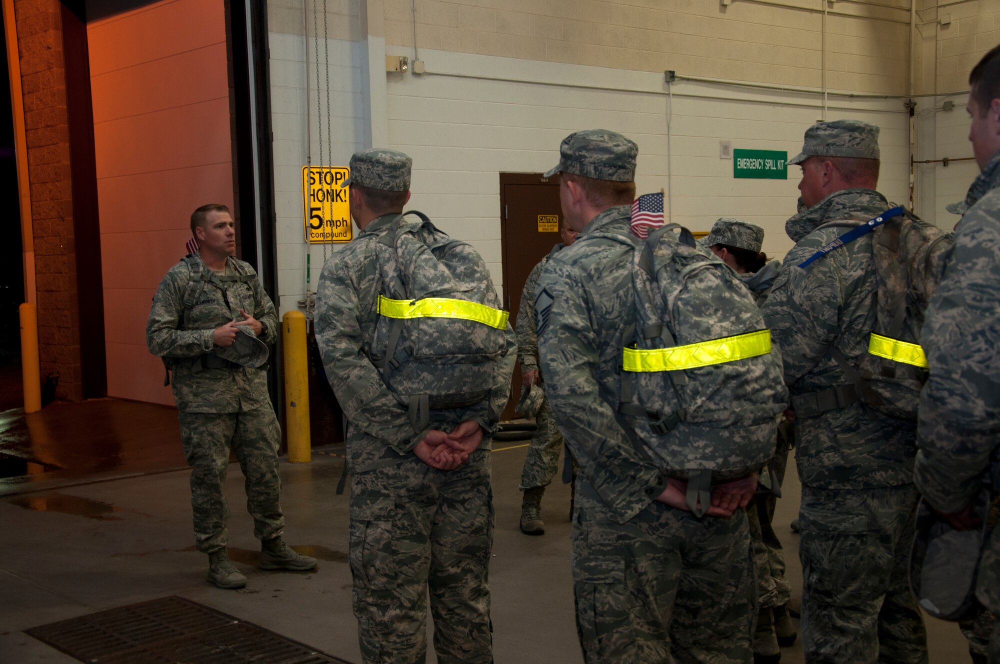 Maj. Chad Ellsworth, 90th Logistics Readiness Squadron commander, speaks to Airmen prior to a three-mile ruck march here Sept. 11, 2013. The 3rd annual march began at dawn. Airmen assigned to the squadron filled ruck sacks with sandbags and marched to Warren’s main gate and the base fire department in memory of all first responders lost on 9/11. (U.S. Air Force photo by Tech. Sgt. Stacy Foster, 90th Missile Wing Public Affairs)