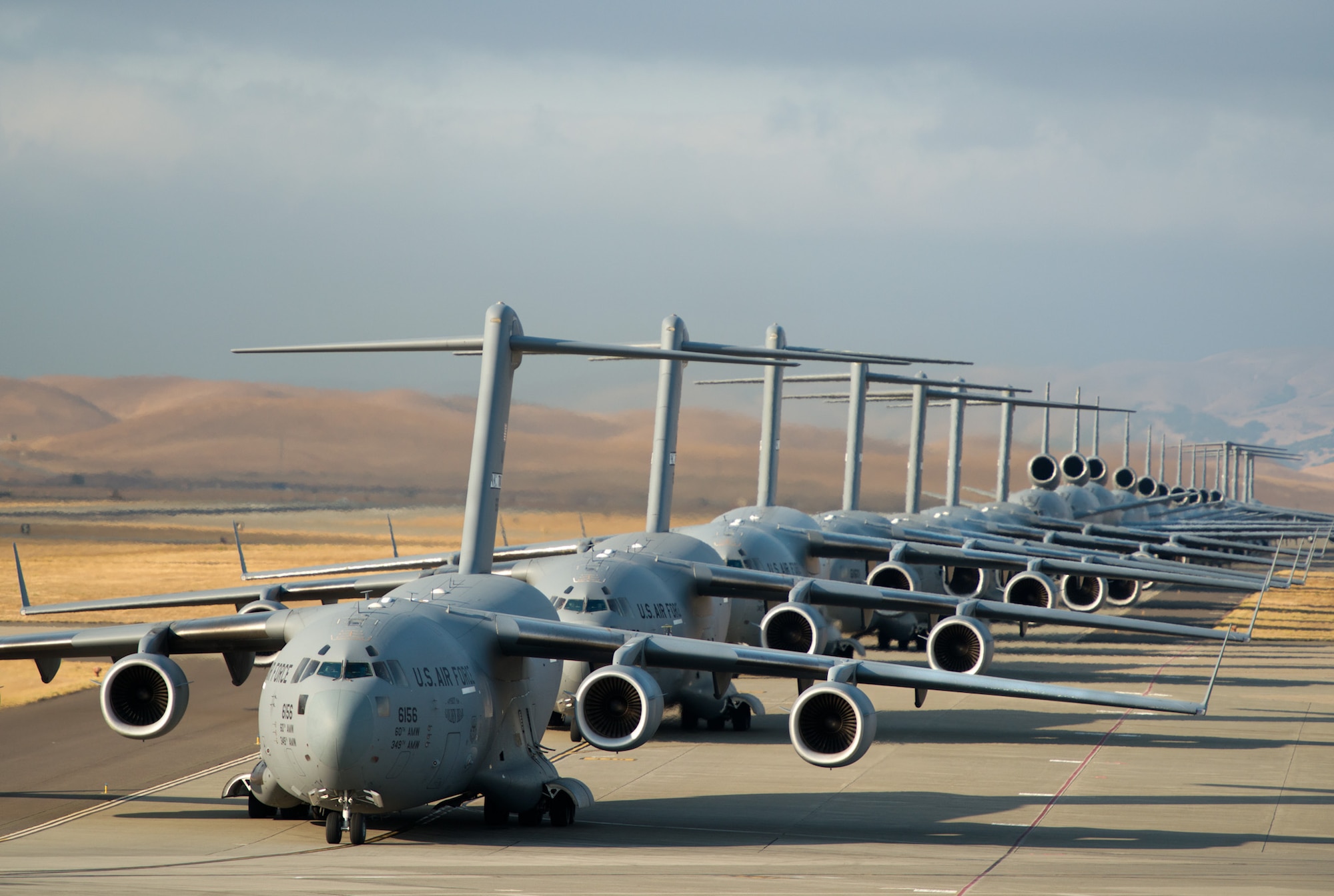 A 22-aircraft "freedom launch" took place at Travis AFB, Calif., Sept. 11, 2013. Seven C-17 Globemaster IIIs, 11 KC-10 Extenders and four C-5B Galaxies from the 60th Air Mobility Wing lined up in what is historically referred to as an "elephant walk," then launched consecutively over 36 minutes to take part in Air Mobility Command missions. The first plane in the lineup, a C-17, launched at 8:46 a.m., the same time terrorists crashed American Airlines Flight 11 into the North Tower of the World Trade Center in New York City 12 years earlier. (U.S. Air Force photo/Ken Wright)