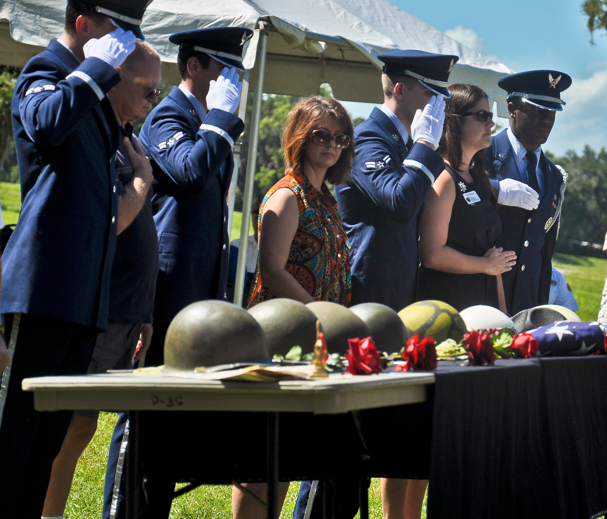 Tampa Bay community members pay their respects to fallen heroes during an honorary "hat ceremony,” Sept. 11, 2013 at the Veterans Memorial Park in Tampa, Fla. The event, the Patriots Day Remembrance, was to mourn those whose lives were lost and those whose were forever altered. (U.S. Air Force photo by Capt. Sara Greco/Released)  