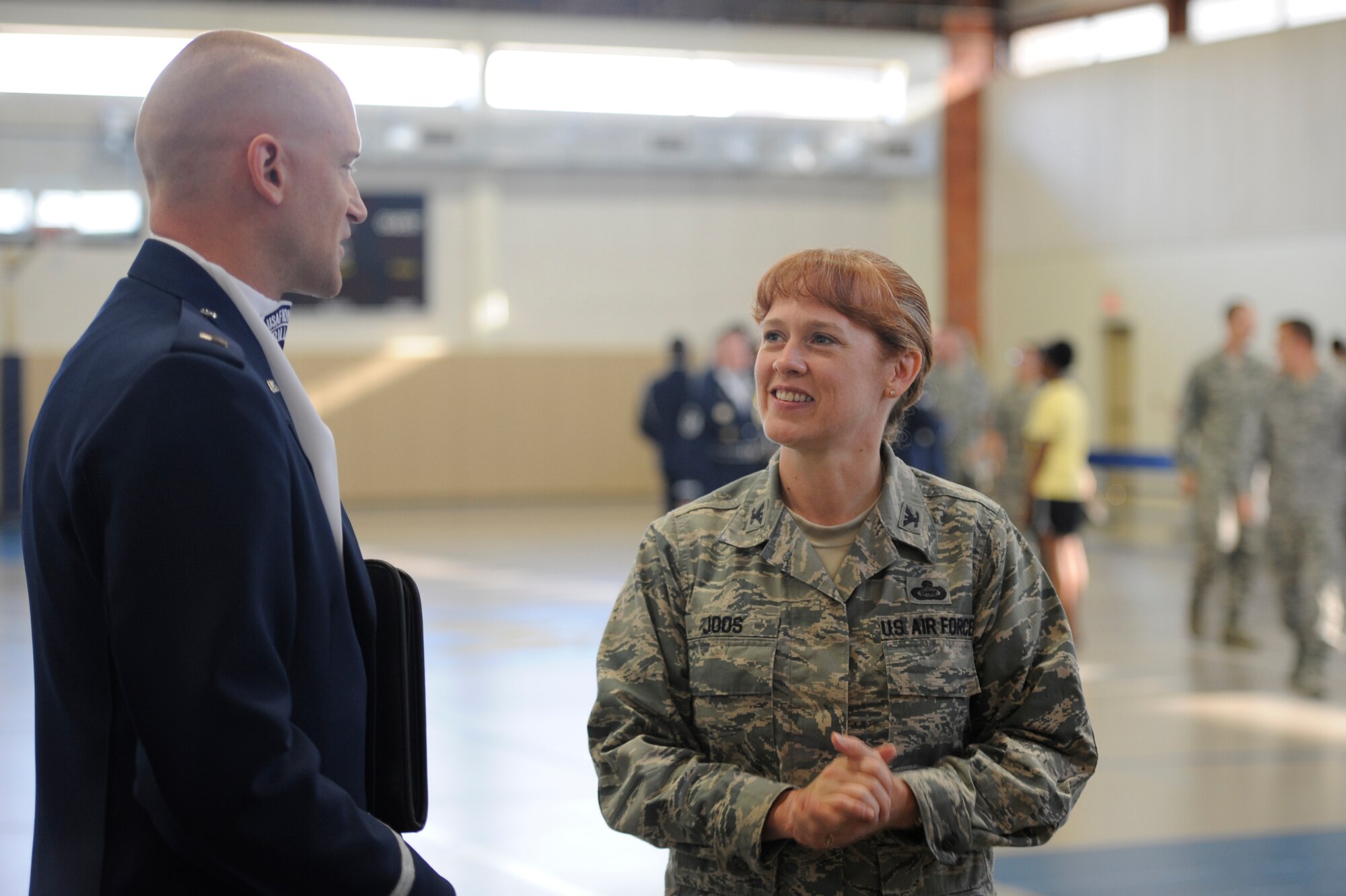 GOODFELLOW AIR FORCE BASE, Texas- Col. Kimberlee Joos, 17th Training Wing Commander, talks to 1st Lt. Michael Lemorie, U.S. Air Force Honor Guard Drill Team commander, at the Carswell Field House Sept. 6. The honor guard came to Goodfellow to hold a demonstration as part of a recruiting event. (U.S. Air Force photo/ Staff Sgt. Austin Knox)