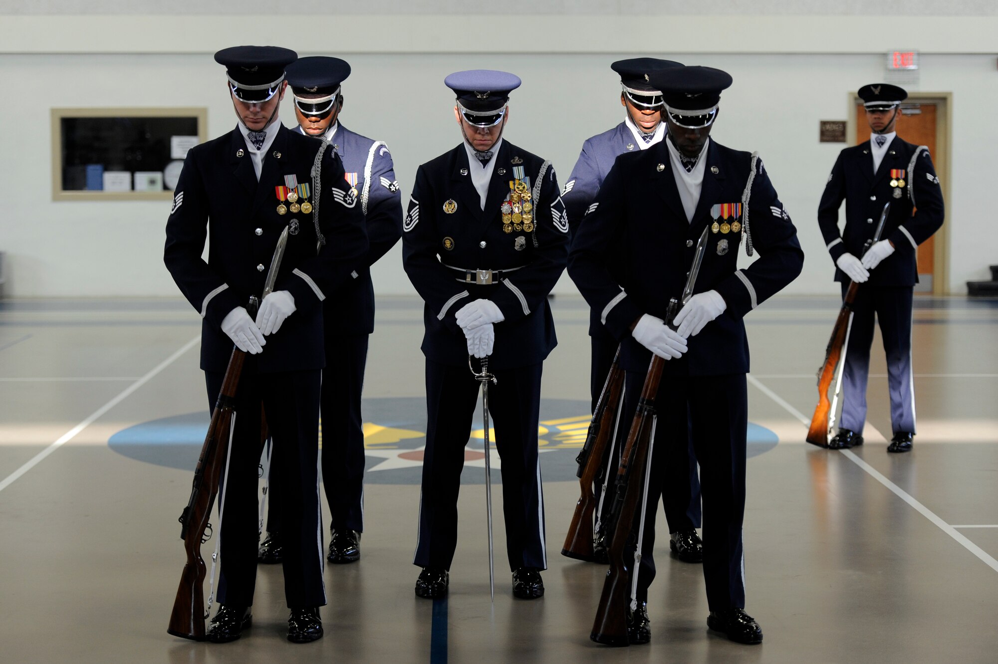 GOODFELLOW AIR FORCE BASE, Texas- The U.S. Air Force Honor Guard Drill Team conducts a drill demonstration as part of a recruiting event at the Carswell Field House Sept. 6.  The vision of the honor guard is to ensure a legacy of Airmen who promote the mission, protect the standards, perfect the image and preserve the heritage of the Air Force. (U.S. Air Force photo/ Staff Sgt. Austin Knox)