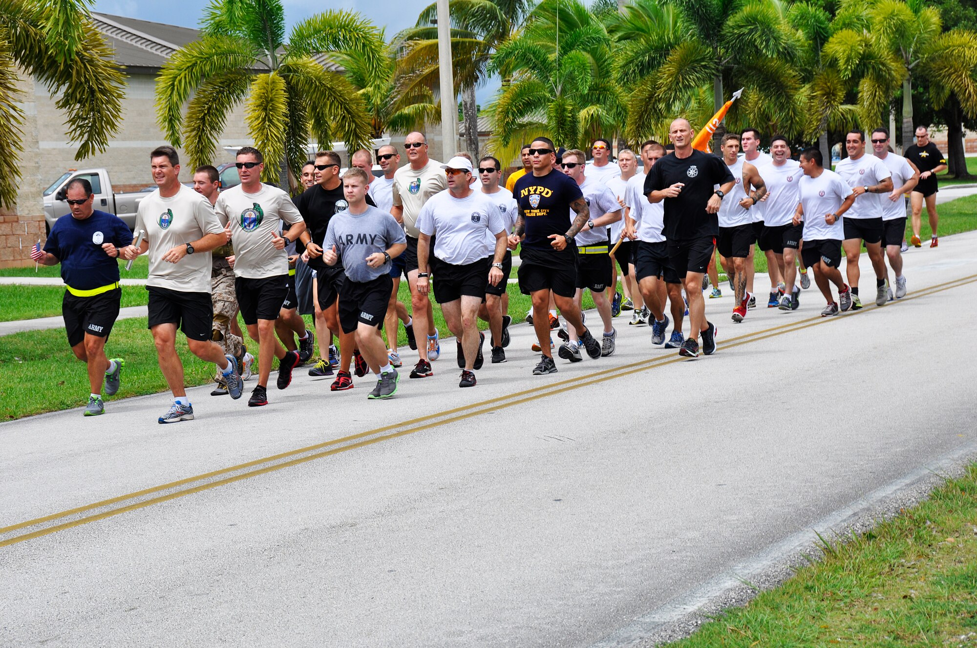 A caveat of services was represented during the Special Operations Command South 9/11 remembrance relay race, Sept. 11. The 140-mile relay race began at the famed southernmost point buoy in Key West, Fla., starting on Sept. 10 at 4 p.m. and concluded at HARB on Sept. 11 at 2 p.m. (U.S. Air Force photo/ Tech. Sgt. Lou Burton)