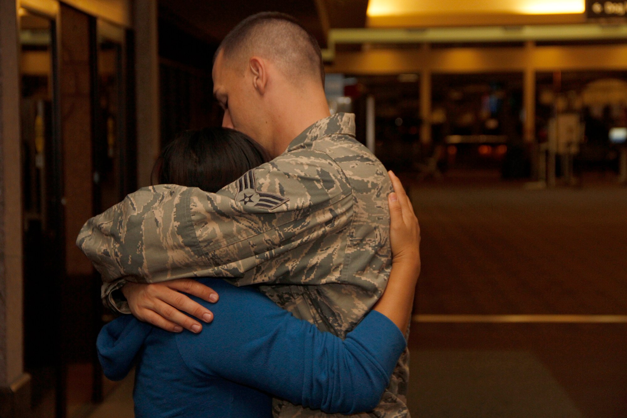 A member of the 39th Aerial Port Squadron holds his girlfriend  before he gets ready to deploy to Southwest Asia in support of Operation Enduring Freedom. This is the second large deployment to Southwest Asia for the 39th APS, in less than three years. (U.S. Air Force photo/Staff Sgt. Nathan Federico)