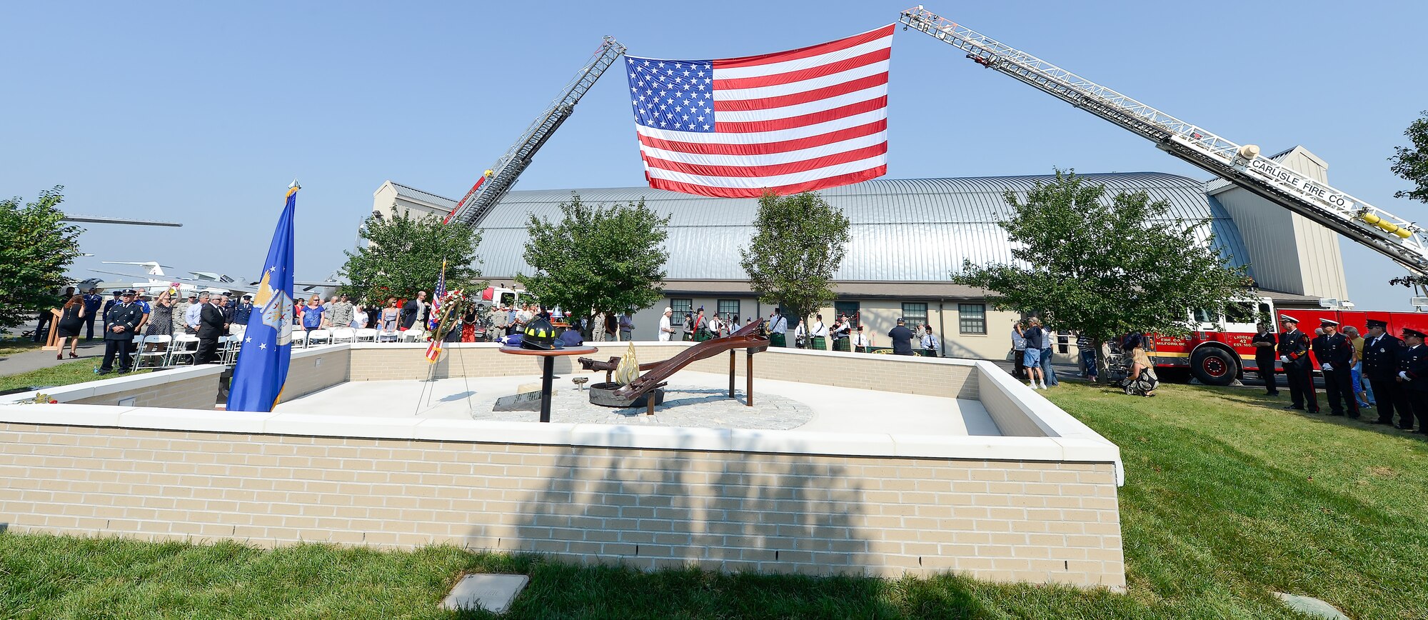 On Sept. 11, 2013 a memorial to those killed on Sept. 11, 2001 was dedicated at the Air Mobility Command museum at Dover Air Force Base, Del. The memorial, which incorporates two pieces of steel from World Trade Center tower one, a rock from the United Airlines Flight 93 crash site and a block from the damaged portion of the Pentagon, makes Delaware the 50th and final state to have a public memorial.  (U.S. Air Force photo/Greg L. Davis)