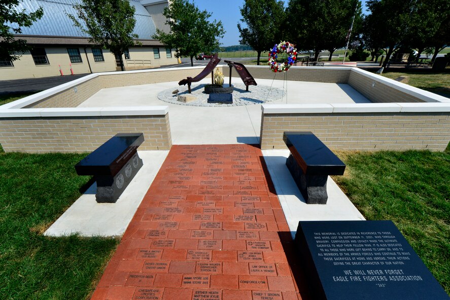 The Sept. 11 Memorial is shown here shortly after the dedication at the Air Mobility Command Museum at Dover Air Force Base, Del., Sept. 11, 2013. The memorial incorporating two pieces of steel from World Trade Center tower one, a rock from the United Airlines Flight 93 crash site and a block from the damaged portion of the Pentagon, was unveiled at the ceremony.  (U.S. Air Force photo/David S. Tucker)