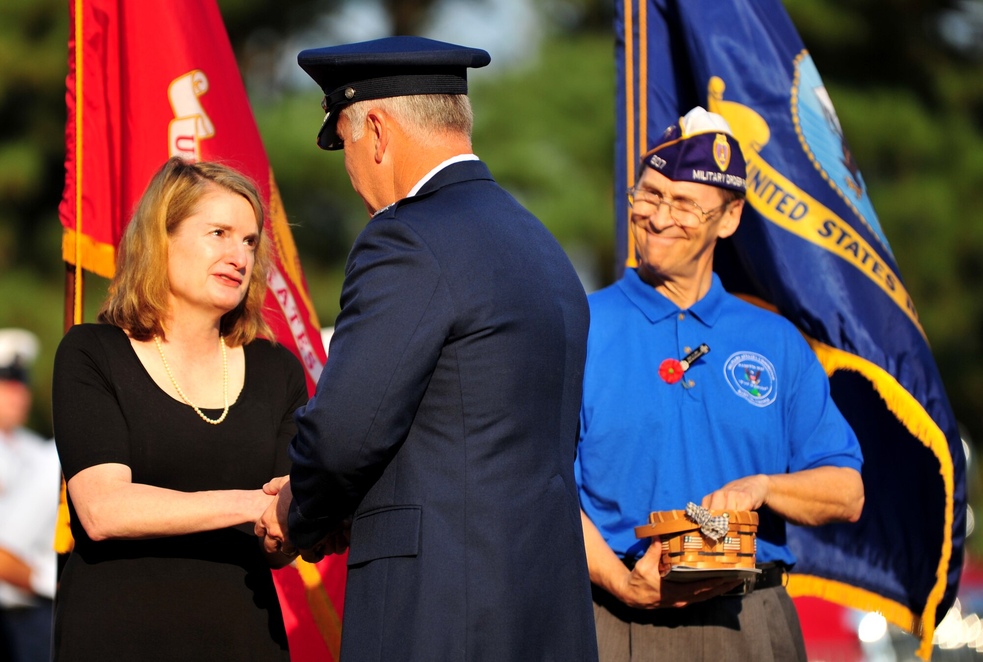Molly Ward, mayor of Hampton, Va., thanks U.S. Air Force Col. John Allen, 633rd Air Base Wing commander, during a remembrance ceremony at Godnold’s Hope Park, Sept. 11, 2013. Both Ward and members of the local Military Affairs Committee recognized the sacrifices and commitment of Service members from every branch of the military. (U.S. Air Force photo by Staff Sgt. Jarad A. Denton/Released)