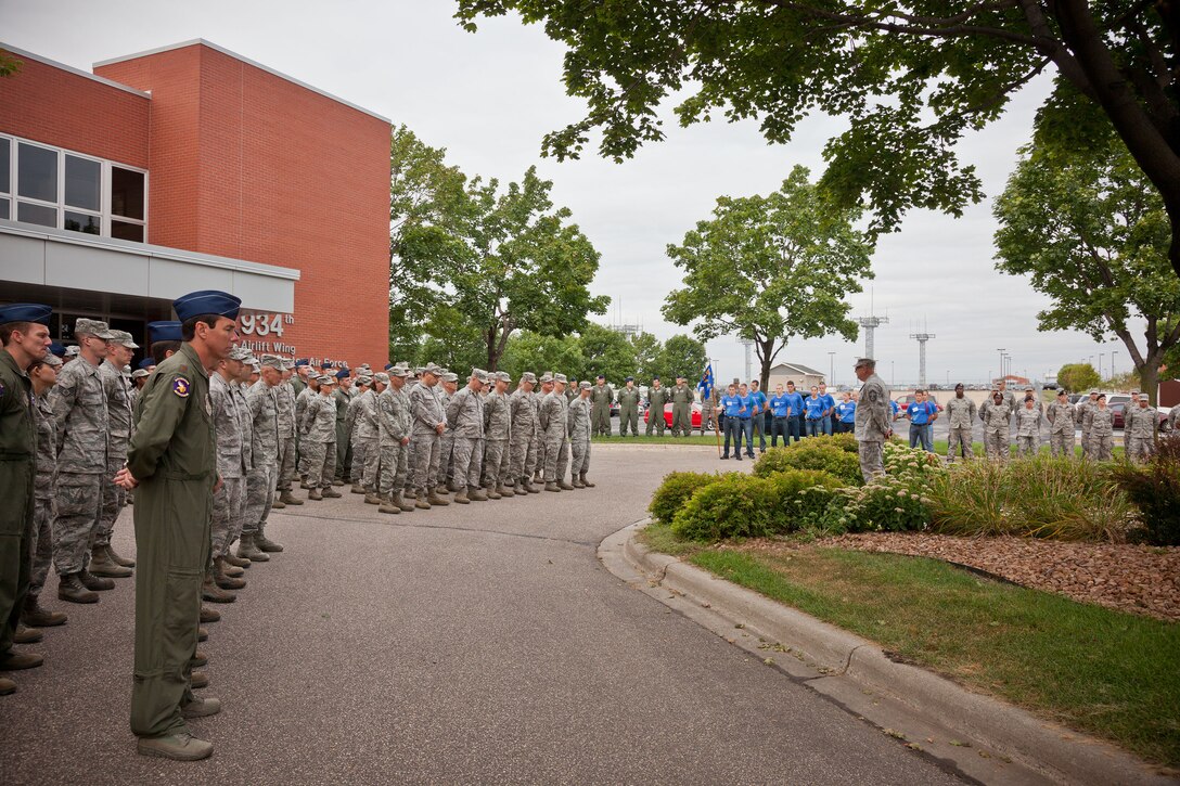 Members of the 934th Airlift Wing hold a Rememberance Ceremony in honor of those lost 9/11 during the September Unit Training Assembly weekend at the Minneapolis-St. Paul Air Reserve Station, Minn.  (U.S. Air Force photo/Shannon McKay)