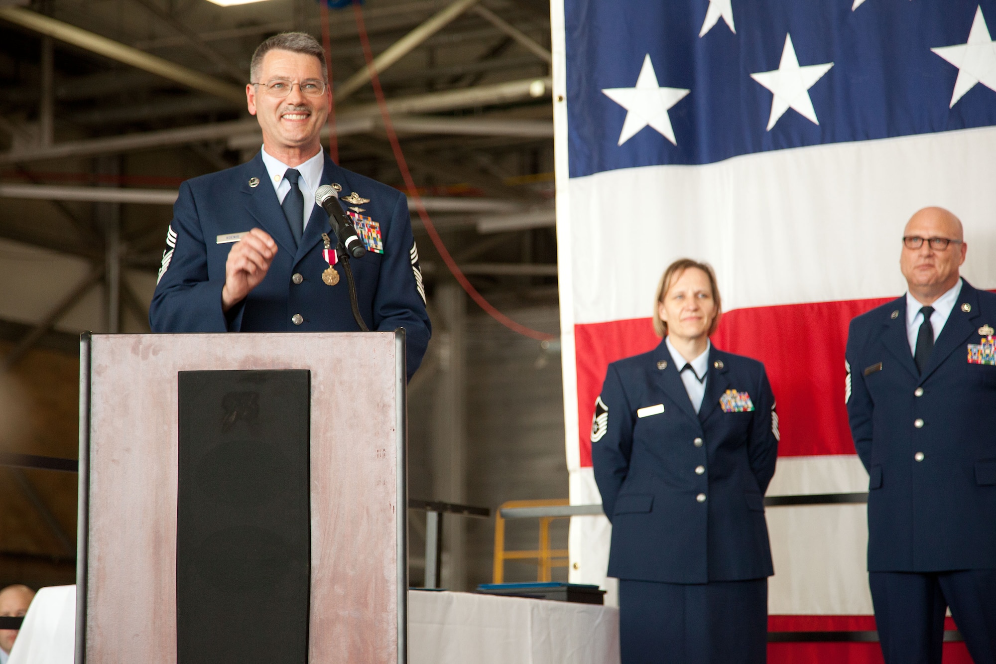 Command Chief Master Sgt. Mark Koenig, 934th Airlift Wing command chief, gives his final remarks during his retirment ceremony.  Chief Koenig retires at the Minneapolis-St. Paul Air Reserve Station, Minn., on September 7th after over 33 years of service.  (U.S. Air Force photo/Shannon McKay)