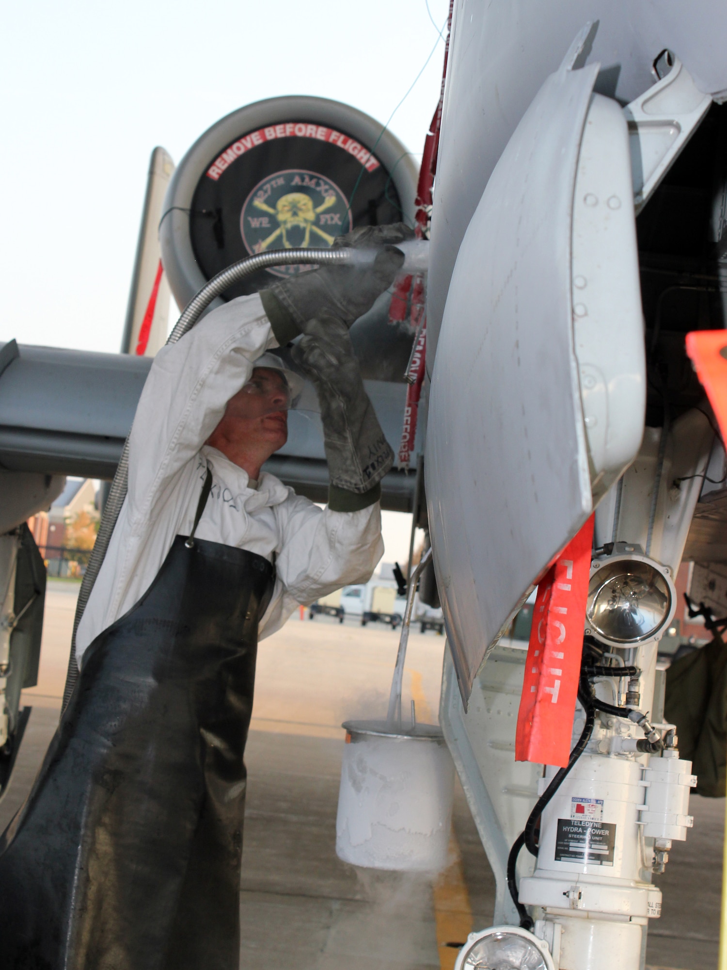 130829-Z-VA676-096 -- Staff Sgt. Scott Dykstra, a crew chief with the 127th Wing, services an A-10 Thunderbolt II with liquid oxygen, or LOX, during routine operations at Selfridge Air National Guard Base, Mich., Aug. 29, 2013. Though the use of LOX is now routine at Selfridge and across the Air Force, it wasn’t until a formation of early “pursuit” planes took off from Selfridge in 1931 that LOX came into general use for military aircraft. (U.S. Air National Guard photo by TSgt. Dan Heaton/Released) 