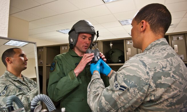 Airman 1st Class Michael Diaz, 4th Special Operations Squadron aircrew flight equipment technician, fits Acting Secretary of the Air Force Eric Fanning’s oxygen mask prior to flying on a CV-22 Osprey and AC-130U Spooky at Hurlburt Field Fla., Sept. 9, 2013. The visit is part of Fanning’s familiarization with various Air Force missions since becoming the acting secretary.
(U.S. Air Force photo/ Senior Airman Krystal M. Garrett)
