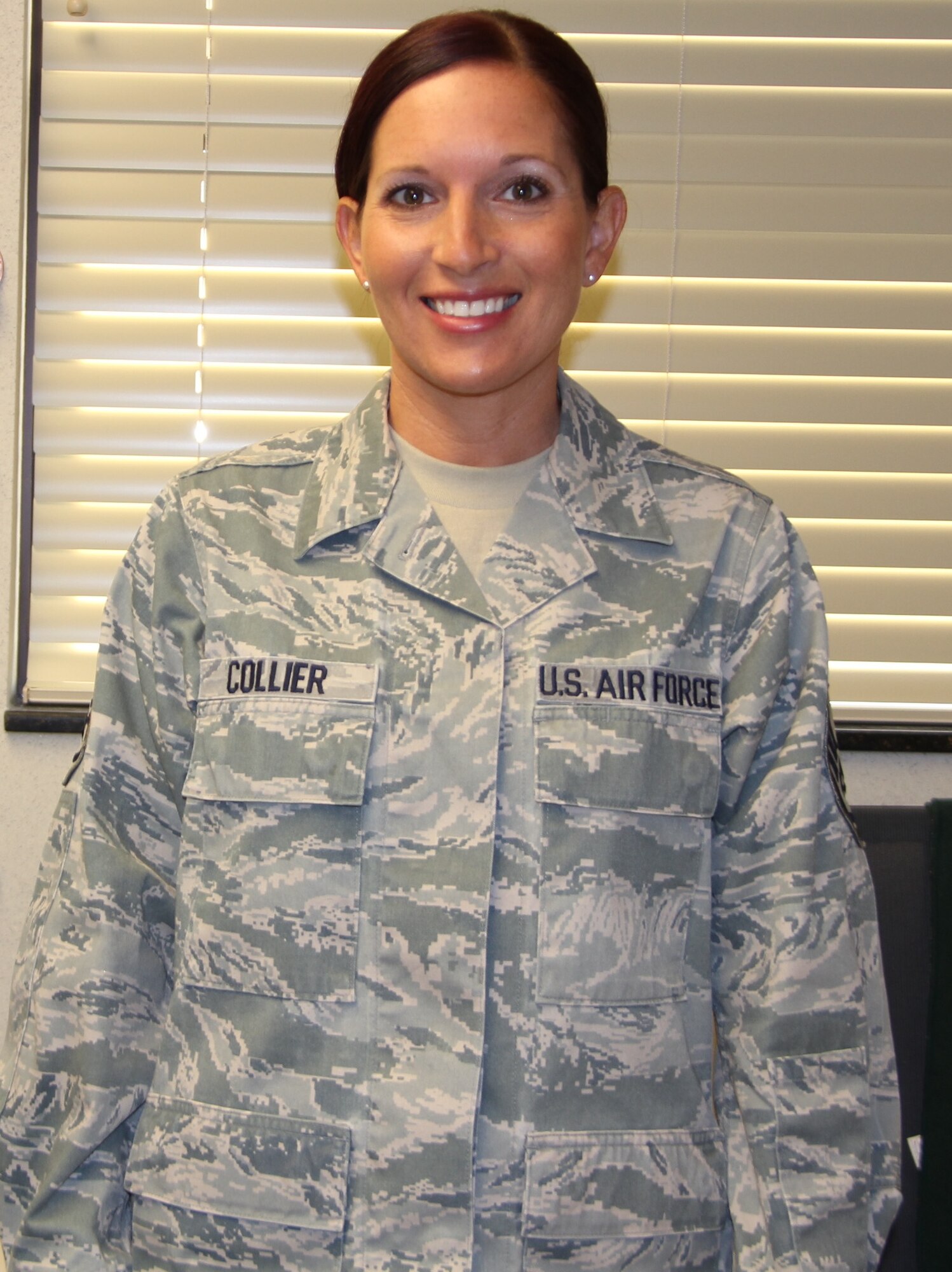 "As a member of the Air Force, it had a profound effect on me.  You never want something like this to happen to your country.  At that moment I realized that all the training that I had gone through to prepare to support and defend my country was going to be utilized.  All the lives that were lost, all the innoncence that was taken from us, it changed our world forever." --Master Sgt. Christa Collier, 932nd Airlift Wing Health Professions Recruiter shared her feelings about 9/11 and what that tragegy meant to her as a member of the AIr Force Reserves.  (U.S. Photo/Staff Sgt. Meiko Schill)