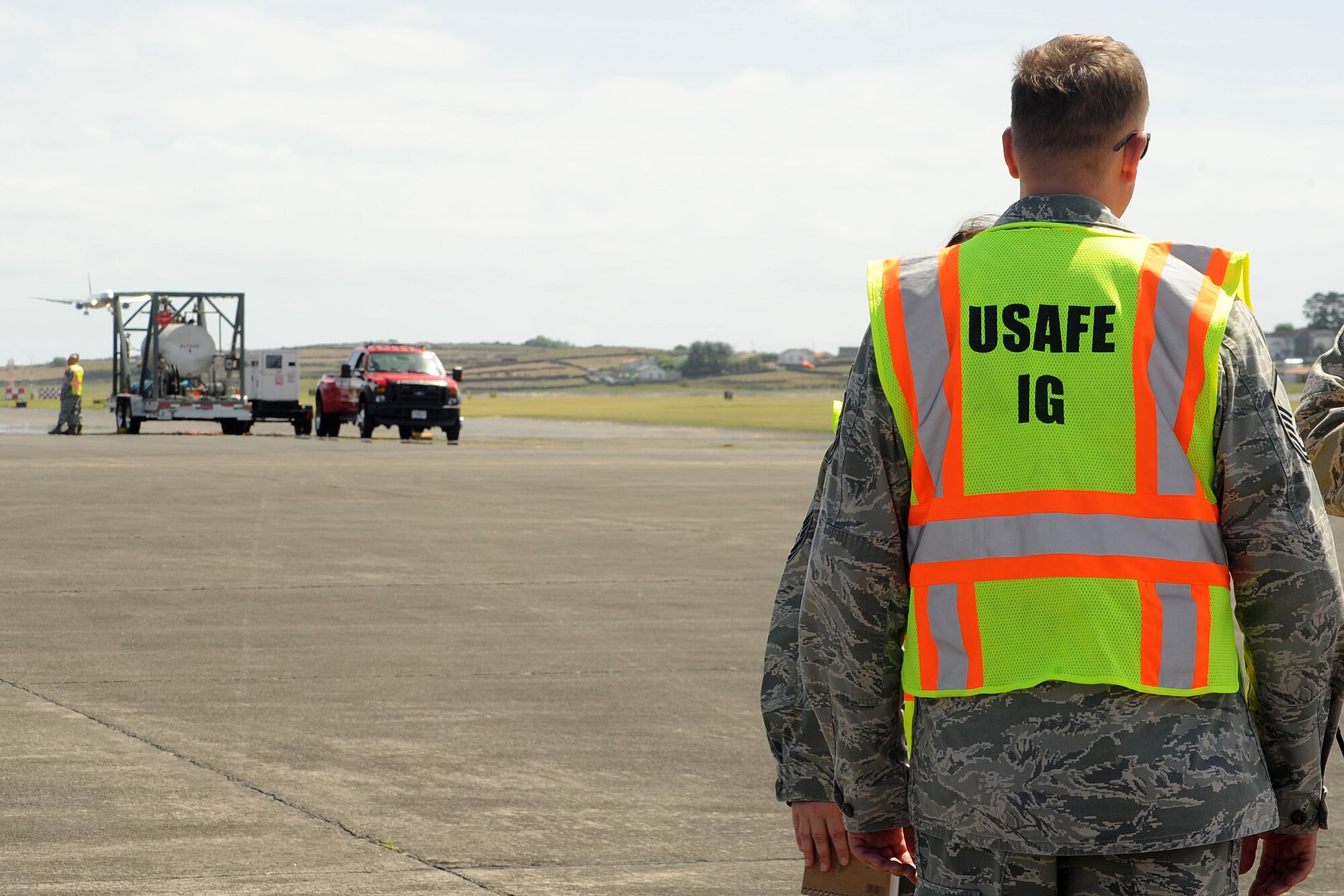 U.S. Air Forces in Europe Inspector General team members evaluate 65th Air Base Wing first responders during a major accident response exercise as part of the wing’s unit effectiveness inspection Sept. 6, 2013, Lajes Field, Azores.  The 65th ABW was rated “highly effective,” demonstrating the wing’s ability to execute its mission, measure mission effectiveness and overall compliance.   (U.S. Air Force photo by Guido Melo/Released)