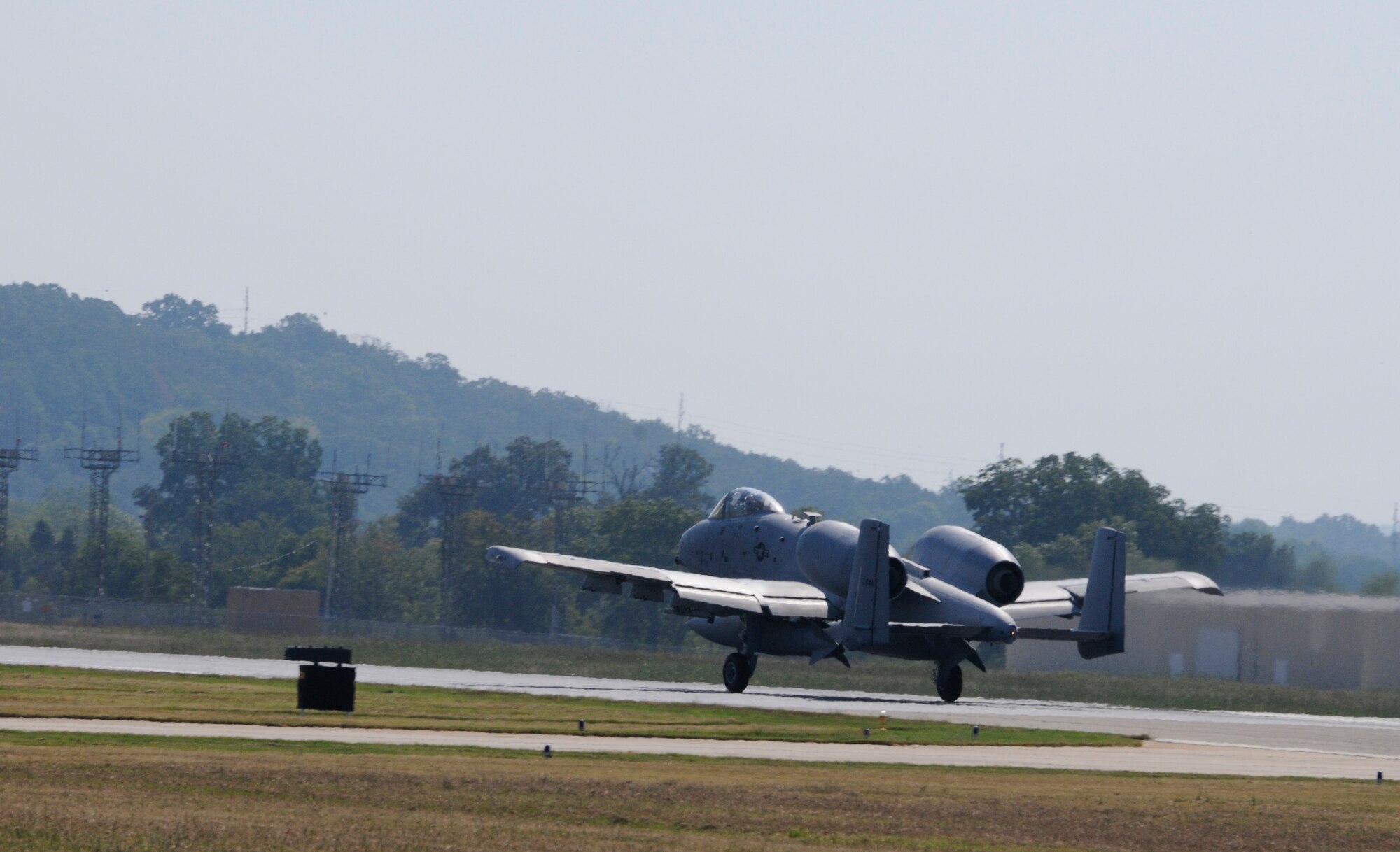 A 188th Fighter Wing A-10C Thunderbolt II “Warthog” takes off at Ebbing Air National Guard Base in Fort Smith, Ark. Sept. 10. The pilot, a member of Moody Air Force Base’s 75th Fighter Squadron, flew Tail No. A0644 back to Georgia, signaling the beginning of the end for the 188th’s fighter mission. The 188th will lose two Warthogs a month until the last two leave in June 2014. The 188th is in the beginning stages of converting from A-10s to an Intelligence and remotely piloted aircraft mission. The mission, which will feature the MQ-9 Reaper, will also boast the Air National Guard’s only space-focused targeting squadron. (U.S. Air National Guard photo by Senior Airman Hannah Landeros/188th Fighter Wing Public Affairs)