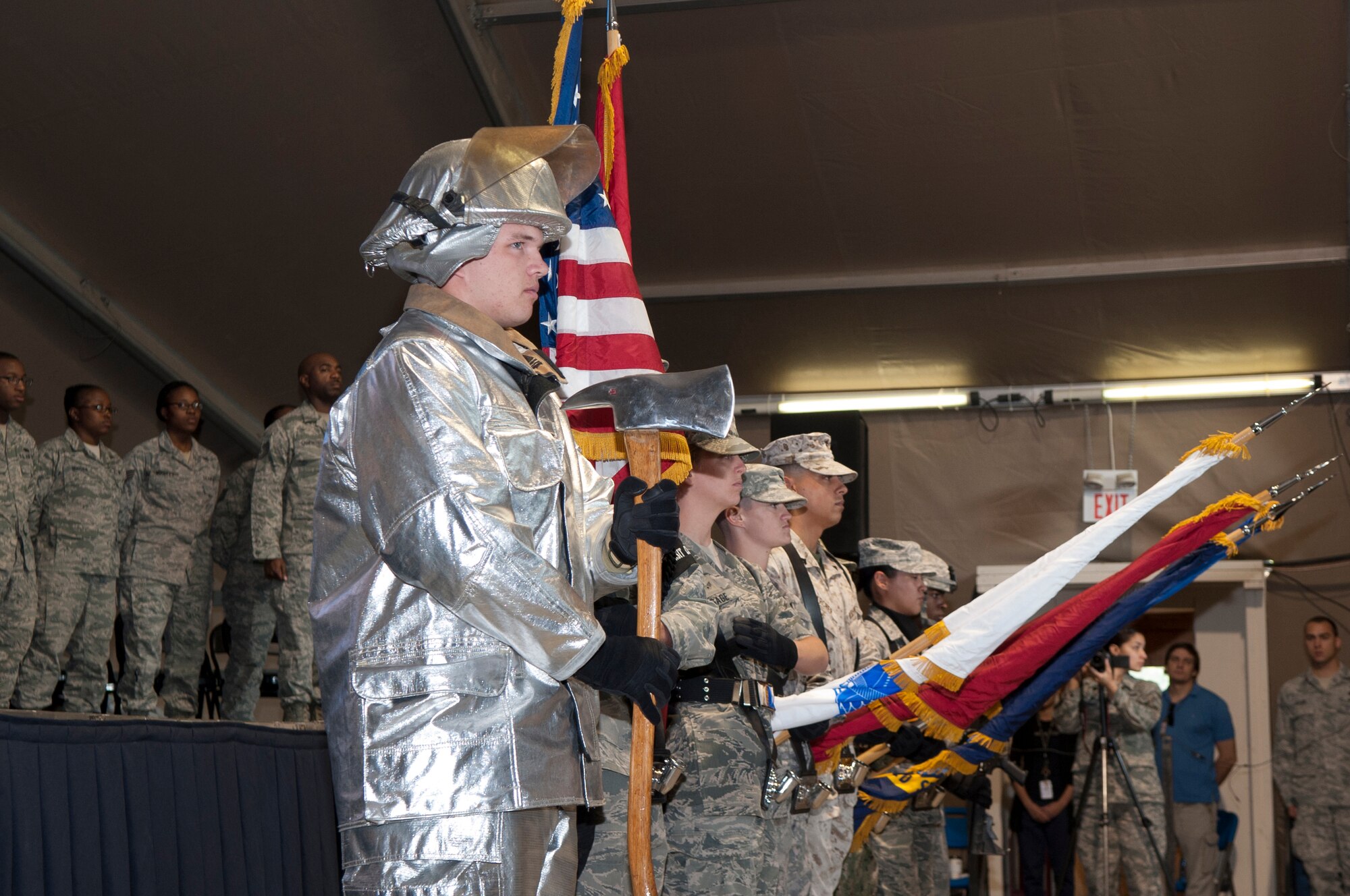 Members of the Transit Center at Manas Honor Guard perform during the 9/11 Memorial Ceremony at the Transit Center, Kyrgyzstan, Sept. 11, 2013. The ceremony allowed Transit Center personnel an opportunity to pay respect to the first responders of Sept. 11, 2001. (U.S. Air Force photo/Staff Sgt. Robert Barnett)