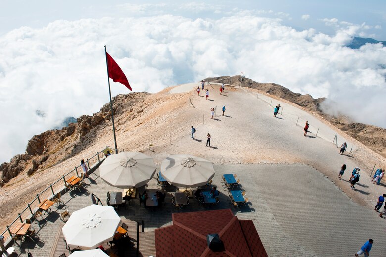 Visitors to Mount Olympos, also known as Tathali Dagi in Turkish, wander around the top of the mountain Sept. 1, 2013, near Antalya, Turkey. The mountain is 2,365 meters, or about 7,858 feet, above sea level and is one of several mountains known as Olympos in the world. (U.S. Air Force photo by Senior Airman Daniel Phelps/Released)