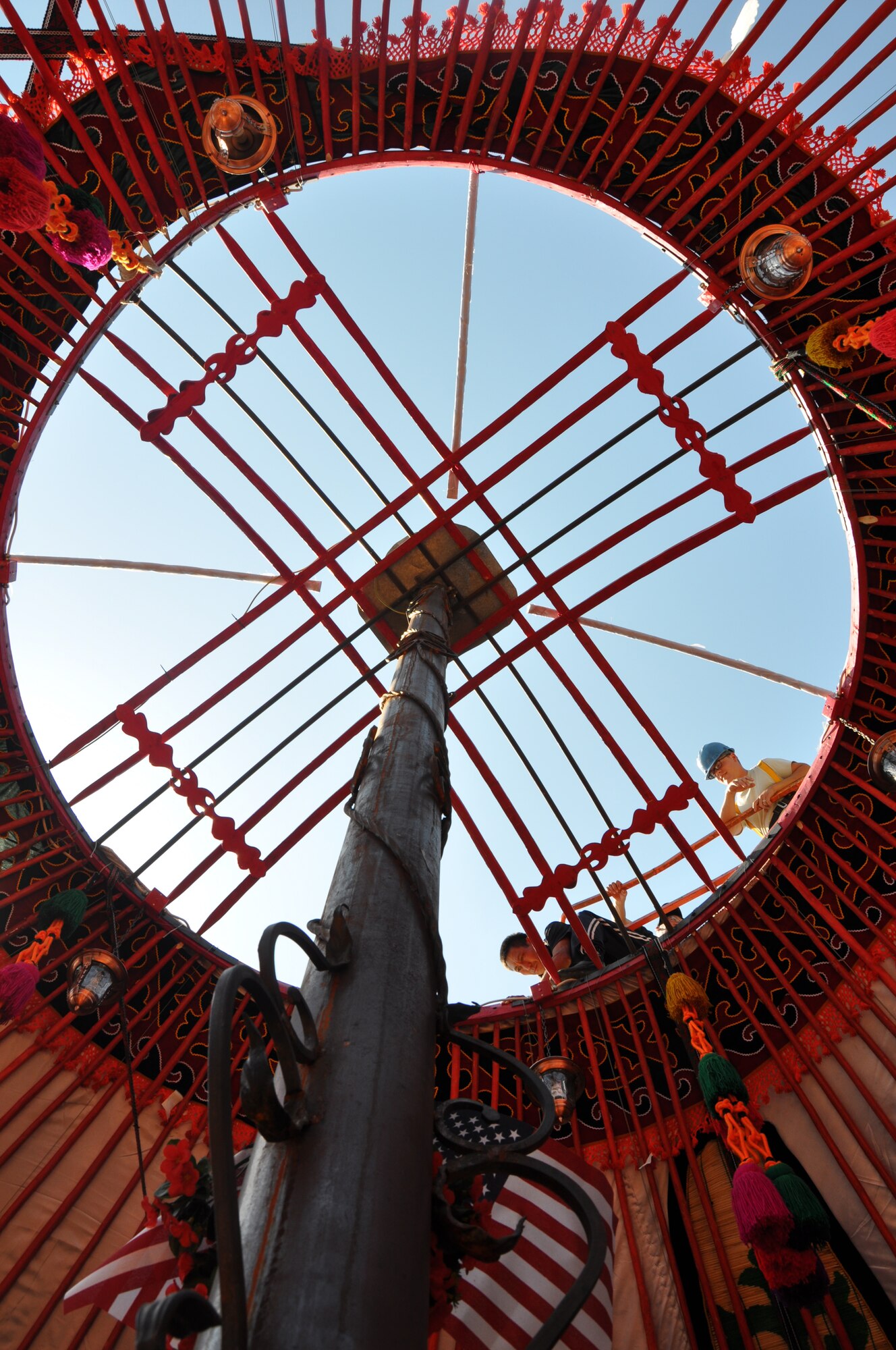 The traditional yurt located on the Transit Center at Manas in Kyrgyzstan, received a new sheep wool covering Sept. 7, 2013. The wooden center of the Yurt features a crown-wheel which is replicated on the center of the Kyrgyzstan national flag. In many Yurts, 40 beams are used to form the roof skeleton representing the 40 Kyrgyz tribes and sun rays also displayed on the national flag. (U.S. Air Force photo/Master Sgt. Donna T. Jeffries)