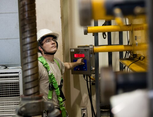 Senior Airman John Ellisor, 8th Maintenance Squadron aerospace ground equipment journeyman, conducts a jack test to ensure it can handle the weight of an F-16 at Kunsan Air Base, Republic of Korea, Sept. 6, 2013. Base leadership named Ellisor as Kunsan’s “Pride of the Pack” for Aug. 26 – Sept. 1. (U.S. Air Force photo by Senior Airman Clayton Lenhardt / Released)