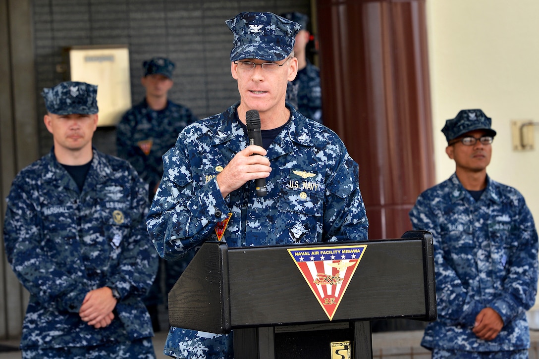 U.S. Navy Capt. Chris Rodeman serves as guest speaker during a 9/11 remembrance ceremony on Naval Air Facility Misawa, Japan, Sept. 11, 2013. Rodeman is commander of Naval Air Facility Misawa. 