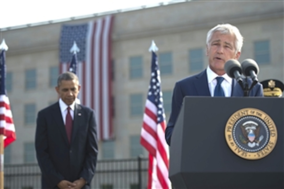 Secretary of Defense Chuck Hagel speaks during a remembrance ceremony to honor the victims of the 9/11 attacks on the Pentagon in Arlington, Va., on Sept. 11, 2013.  President Barack Obama joined Hagel, Chairman of the Joint Chiefs of Staff Gen. Martin Dempsey and family members of those killed in the terrorist attack twelve years ago to remember and mark the anniversary.  