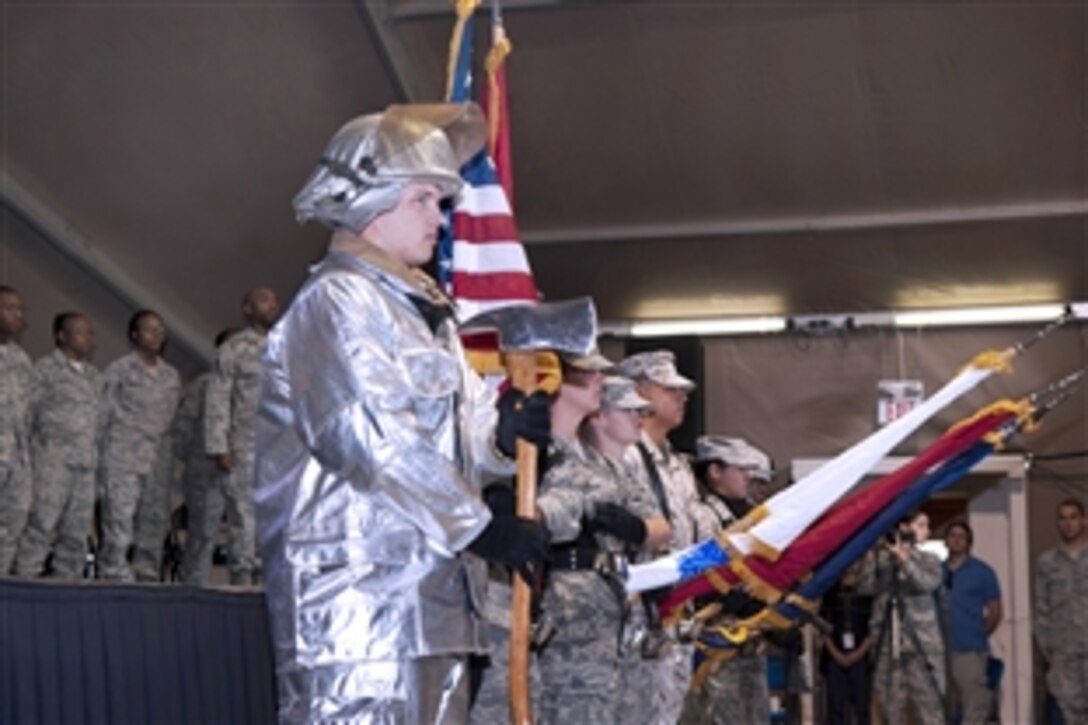 U.S. troops perform during a 9/11 memorial ceremony at the International Transit Center in Manas, Kyrgyzstan, Sept. 11, 2013. The ceremony allowed service members and personnel an opportunity to pay respect to the first responders of the 9/11 terrorist attacks.