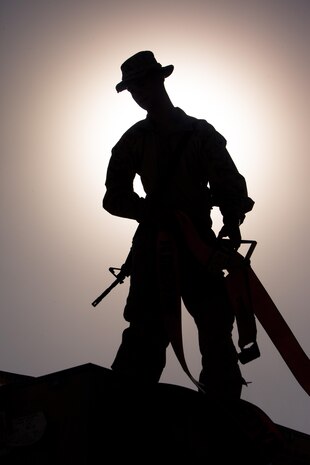 A Marine with Combat Logistics Regiment 2, Regional Command (Southwest), unstraps supplies at Forward Operating Base Shir Ghazi, Helmand province, Afghanistan, after completing a combat logistics patrol Aug. 27, 2013. The regiment took part in a combat logistics patrol to deliver supplies to Marines throughout the area while simultaneously conducting backhaul operations.