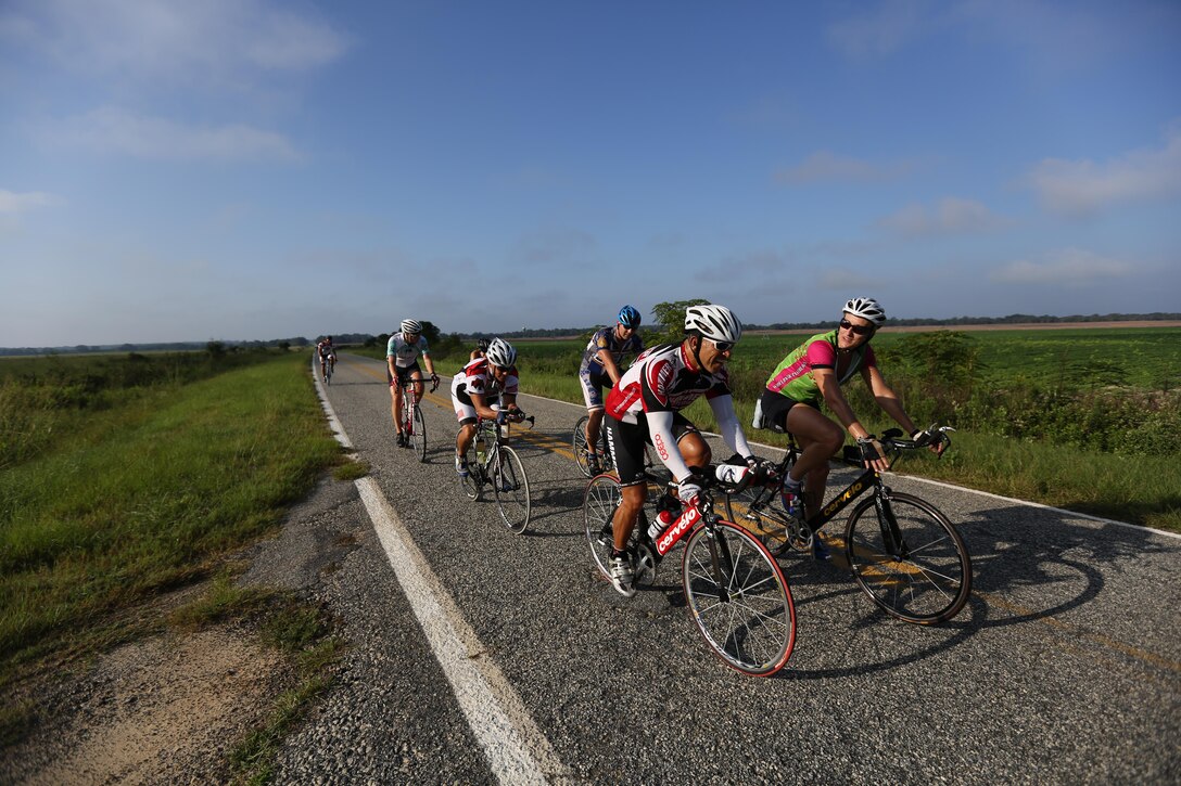 Servicemembers, members of the Gwinnett Sheriffs department and Georgia State Trooper ride their bikes on the second day of Operation One Voice Honor Ride, Sept. 5, 2013. Marines with U.S. Marine Corps Forces Special Operations Command were invited to ride in the Honor Ride to support wounded and deceased veteran members of the U.S. Special Operations community.The Honor Ride this year was a 450-mile bike ride over a four day period.(U.S. Marine Corps photo by Sgt. Anthony Carter/Released)