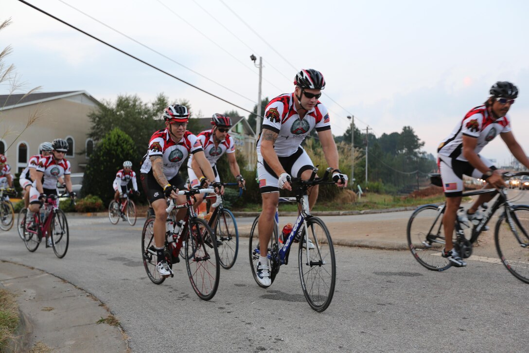Servicemembers, members of the Gwinnett Sheriffs department and Georgia State Trooper ride their bikes during the third day of the Operation One Voice Honor Ride, Sept. 6, 2013. Marines with U.S. Marine Corps Forces Special Operations Command were invited to ride in the Honor Ride to support wounded and deceased veteran members of the U.S. Special Operations community.The Honor Ride this year was a 450-mile bike ride over a four day period. (U.S. Marine Corps photo by Sgt. Anthony Carter/Released)