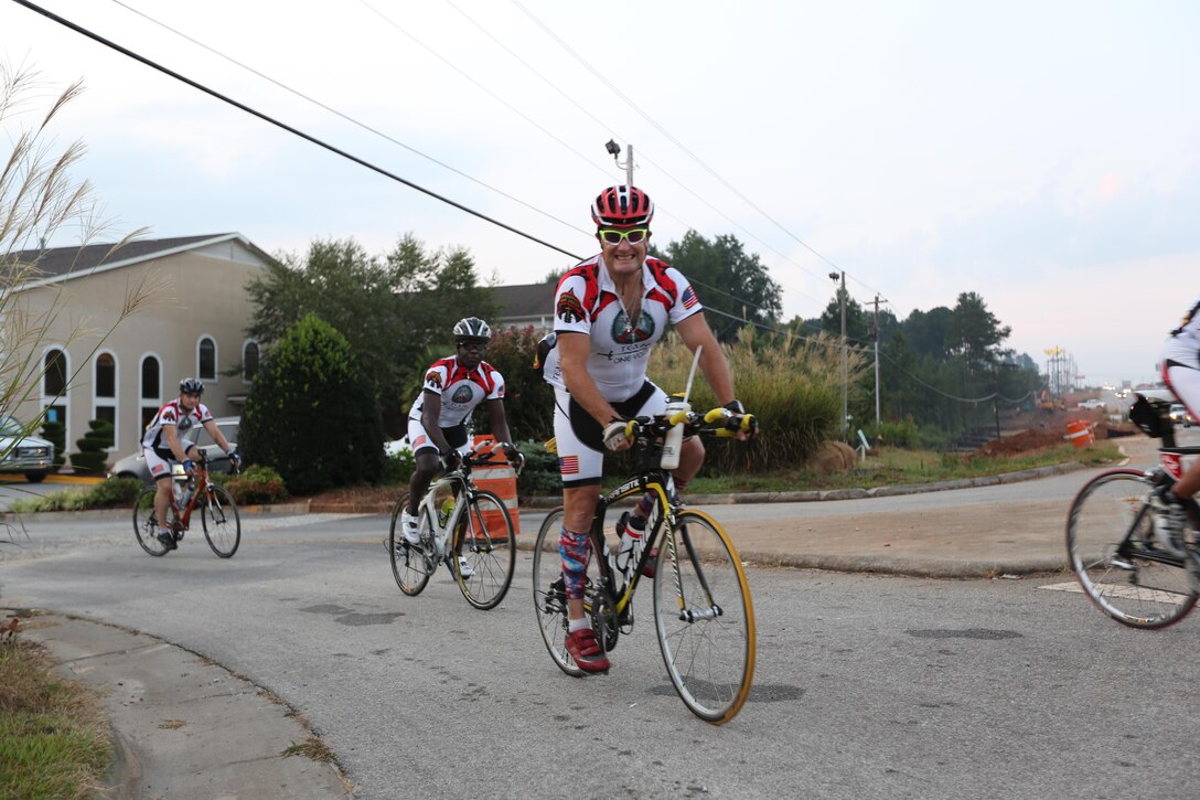 Major Gen. Mark A. Clark,commander, U.S. Marine Corps Forces, Special Operations Command, rides his bike during the third day of the Operation One Voice Honor Ride, Sept. 6, 2013. Marines with U.S. Marine Corps Forces Special Operations Command were invited to ride in the Honor Ride to support wounded and deceased veteran members of the U.S. Special Operations community.The Honor Ride this year was a 450-mile bike ride over a four day period. (U.S. Marine Corps photo by Sgt. Anthony Carter/Released)