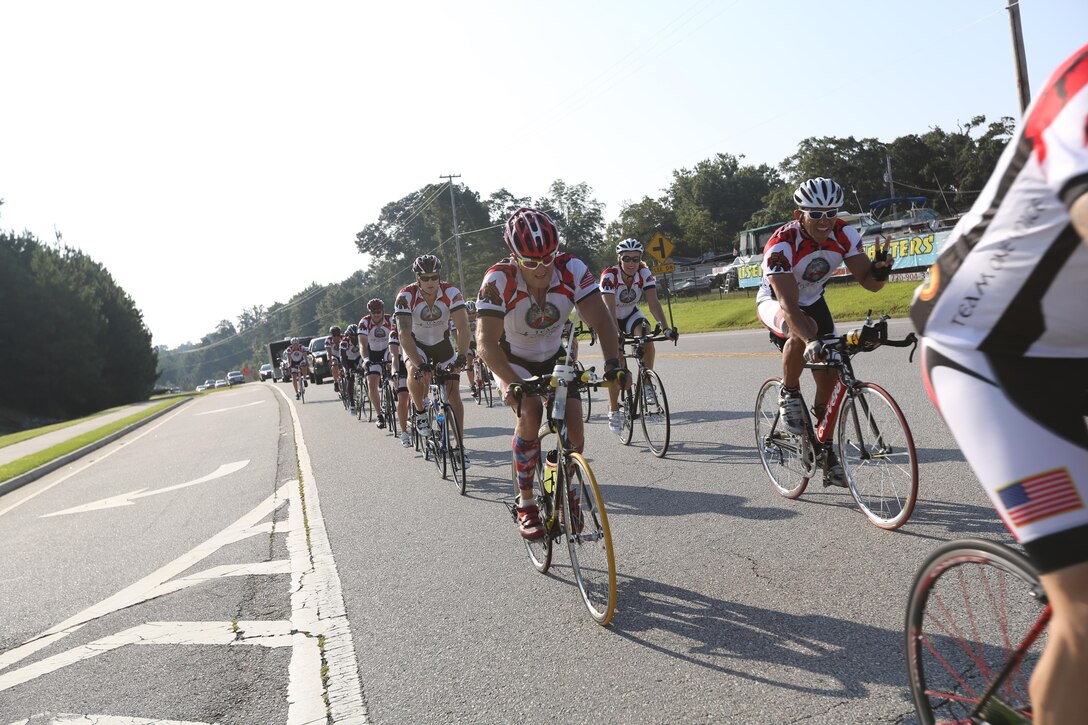 Servicemembers, members of the Gwinnett Sheriffs department, Georgia State Trooper and voluteers ride their bikes during the final day of the Operation One Voice Honor Ride, Sept. 7, 2013. Marines with U.S. Marine Corps Forces Special Operations Command were invited to ride in the Honor Ride to support wounded and deceased veteran members of the U.S. Special Operations community.The Honor Ride this year was a 450-mile bike ride over a four day period. (U.S. Marine Corps photo by Sgt. Anthony Carter/Released)