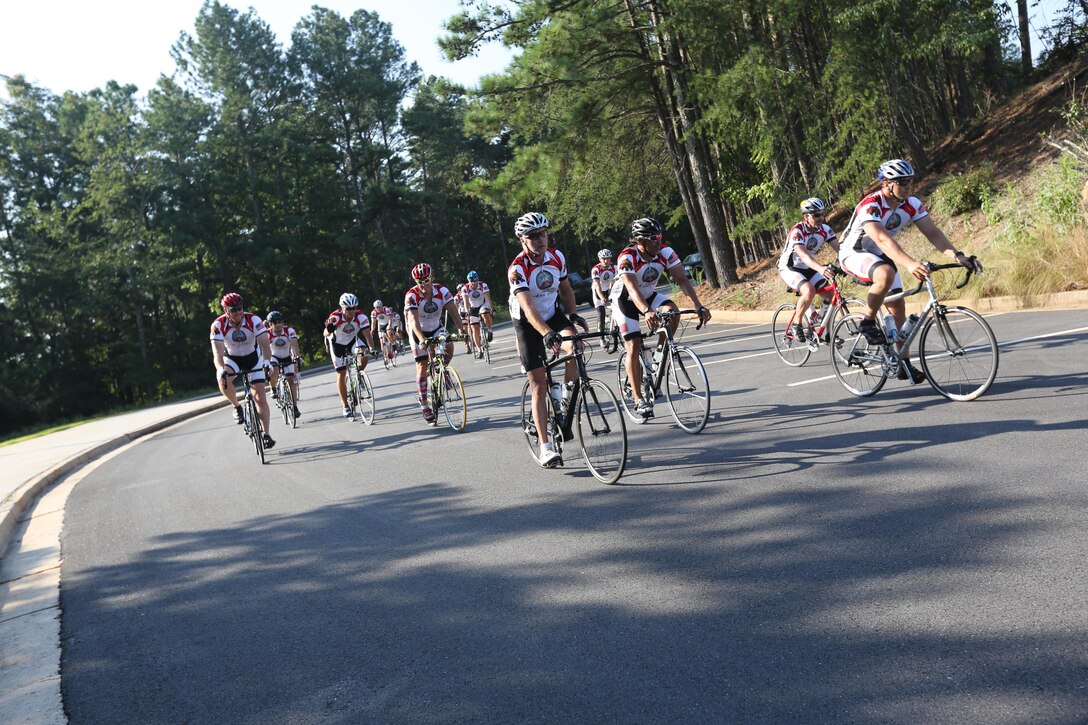 Servicemembers, members of the Gwinnett Sheriffs department, Georgia State Trooper and voluteers ride their bikes during the final day of the Operation One Voice Honor Ride, Sept. 7, 2013. Marines with U.S. Marine Corps Forces Special Operations Command were invited to ride in the Honor Ride to support wounded and deceased veteran members of the U.S. Special Operations community.The Honor Ride this year was a 450-mile bike ride over a four day period. (U.S. Marine Corps photo by Sgt. Anthony Carter/Released)