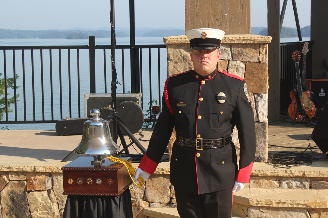 A firefighter with Gwinnett County Fire Department rings the Operation One Voice bell, Sept. 8, 2013, five for five, after the final ceremony in commemoration of all the first responders and servicemembers killed since 9-11.  Marines with U.S. Marine Corps Forces Special Operations Command were invited to ride in the Honor Ride to support wounded and deceased veteran members of the U.S. Special Operations community.The Honor Ride this year was a 450-mile bike ride over a four day period. (U.S. Marine Corps courtesy photo/Released)