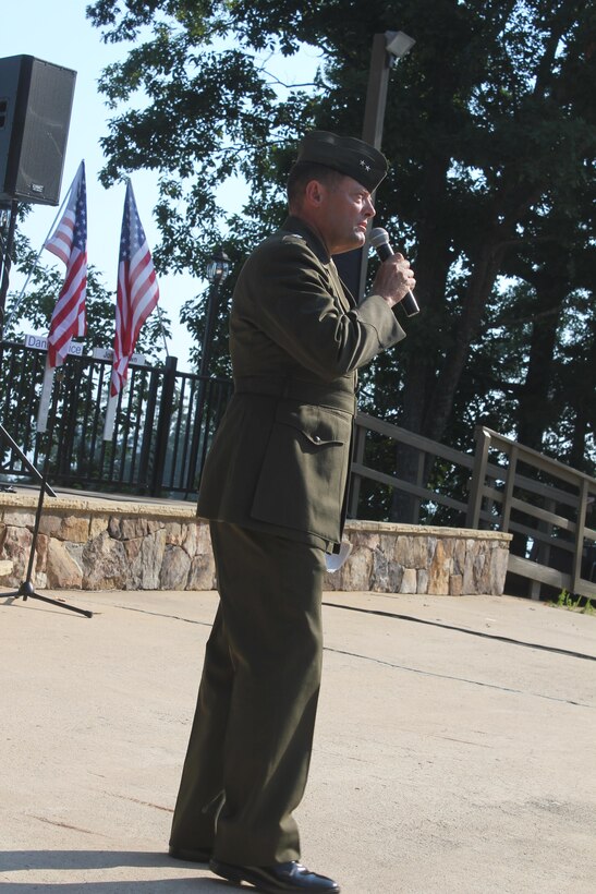 Major Gen. Mark A. Clark, commander, U.S. Marine Corps Forces, Special Operations Command, speaks to family members, friends, wounded warriors, veterans, first responders of Gwinnet County and servicemembers who participated in the ride during a ceremony after the Operation One Voice Honor Ride, Sept. 8, 2013. Marines with U.S. Marine Corps Forces Special Operations Command were invited to ride in the Honor Ride to support wounded and deceased veteran members of the U.S. Special Operations community.The Honor Ride this year was a 450-mile bike ride over a four day period. (U.S. Marine Corps courtesy photo/Released)
