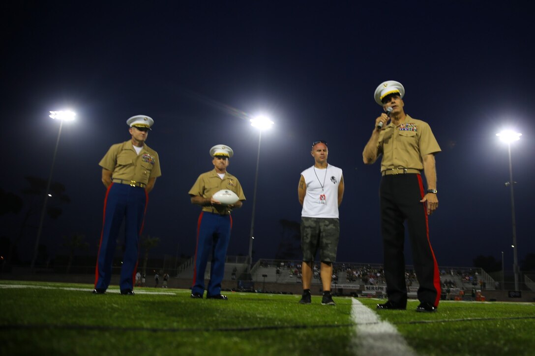Brigadier Gen. John Bullard, right, commanding general, Marine Corps Installations West and Marine Corps Base Camp Pendleton, addresses spectators during the Honor Bowl here, Sept. 7, 2013. The Honor Bowl is a two-day event put together by the Honor Group to raise awareness of the sacrifices of servicemembers.