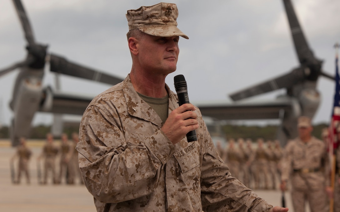 Brig. Gen. Steven R. Rudder addresses the crowd Aug. 30 during the Marine Medium Tiltrotor Squadron 262 redesignation ceremony at Marine Corps Air Station Futenma. The redesignation symbolizes the completion of the squadron's transition from CH-46E Sea Knight helicopters to MV-22B Osprey tiltrotor aircraft and the improvement of III Marine Expeditionary Force operational agility. The Osprey provides increased operational range and load-carrying capabilities, providing improved rapid-response ability to contingencies throughout the Asia-Pacific region. VMM-262 is a part of Marine Aircraft Group 36, 1st Marine Aircraft Wing, III MEF. Rudder is the commanding general of 1st MAW.