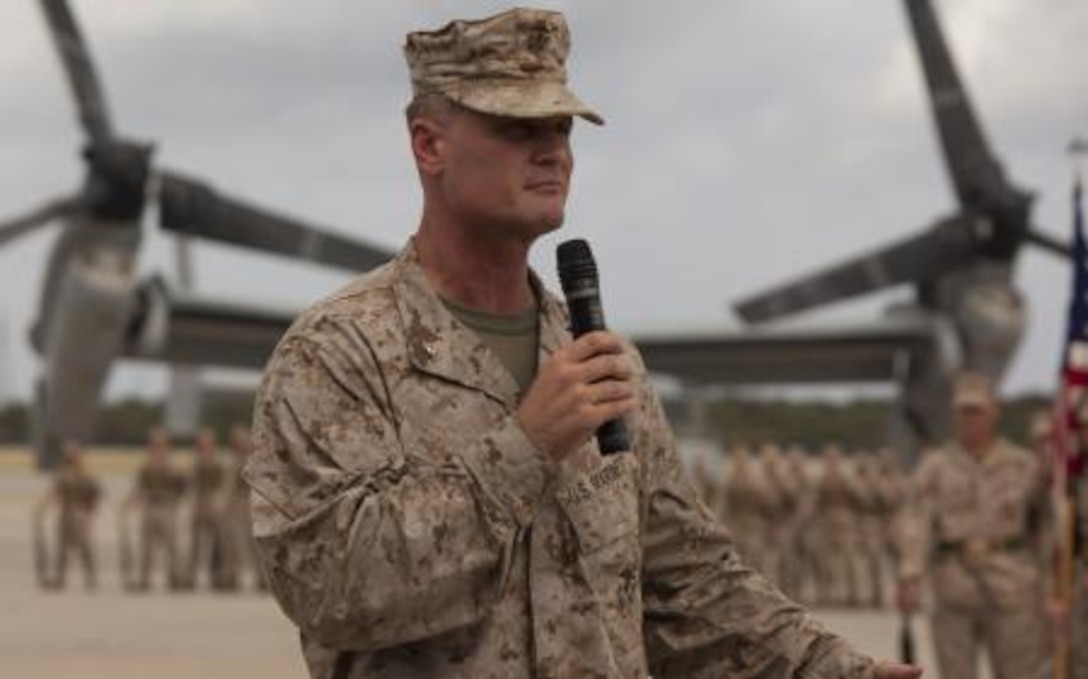 Brig. Gen. Steven R. Rudder addresses the crowd Aug. 30 during the Marine Medium Tiltrotor Squadron 262 redesignation ceremony at Marine Corps Air Station Futenma. The redesignation symbolized the squadron's transition from CH-46E Sea Knight helicopters to MV-22B Osprey tiltrotor aircraft and the improvement of III Marine Expeditionary Force operational agility. VMM-262 is a part of Marine Aircraft Group 36, 1st Marine Aircraft Wing, III MEF. Rudder is the commanding general of 1st MAW.