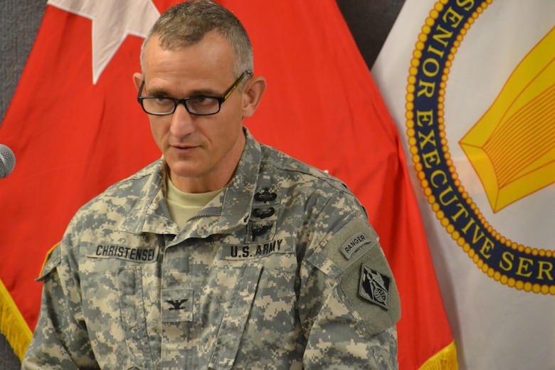 Col. Jon Christensen, Middle East District Commander, gives a speech at the USACE Deployment Center Closing Ceremony, Sept. 12, 2013, acknowledging the hard and exceptional work performed by the UDC staff from May 2005 to September 2013.