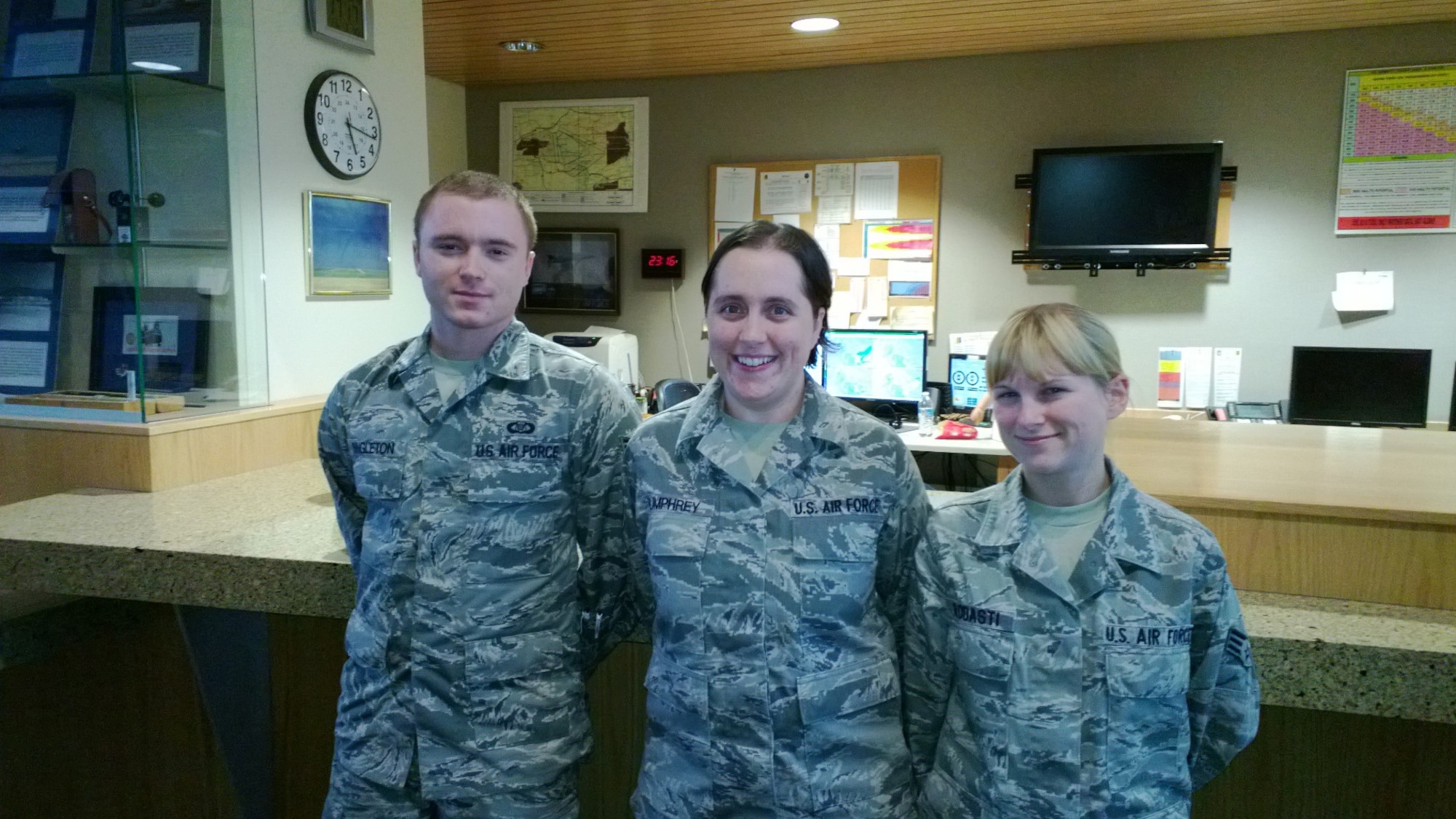 Support personnel from Ellsworth Air Force Base, S.D., pose for a photo. From left to right are Senior Airmen Steven Singleton and Ariell Rodasti, 28th Operations Support Squadron members; and Staff Sgt. Jessica Humphrey, 28th OSS weather member. Support personnel not pictured include Tech. Sgt. Joshua Burback and Master Sgt. James Shoemake, 28th OSS base tower members. (U.S. Air Force photo/Maj. Kurt Ponsor)