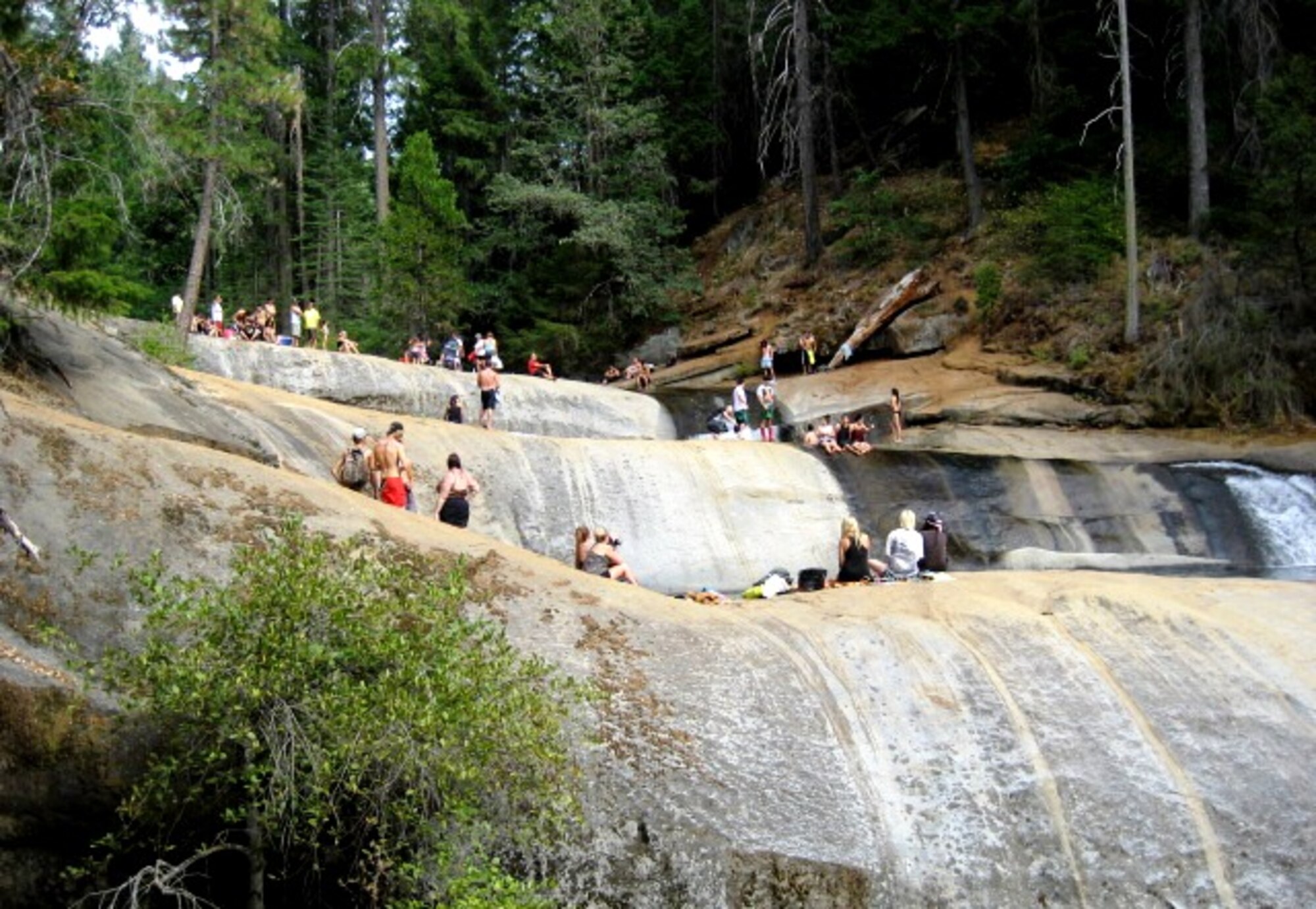 To beat the summer heat, locals flock to a popular swimming hole in a remote canyon of the Sierra foothills near Beale Air Force Base, Calif. Area emergency services have responded to a dramatic increase in rescues from the isolated location in recent years. (Courtesy Photo) 