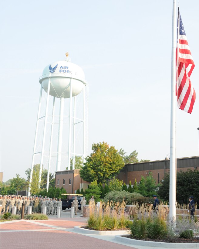 YOUNGSTOWN AIR RESERVE STATION, Ohio—YARS personnel stand at parade rest listening to remarks during a Sept. 11th memorial ceremony, here. Youngstown Air Reserve Station employees paused during their work day to remember the tragic events of Sept. 11, 2001. U.S. Air Force photo by TSgt. Rick Lisum.