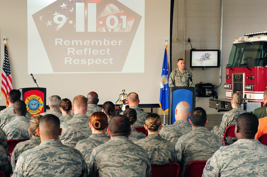 U.S. Air Force Maj. Troy Jones, 4th Security Forces Squadron commander, speaks during a 9/11 memorial ceremony at Seymour Johnson Air Force Base, N.C., Sept. 11, 2013.  Hundreds of members of Team Seymour attended the ceremony to honor the fallen victims and first-responders of the 9/11 attacks.  (U.S. Air Force photo by Airman 1st Class Brittain Crolley)